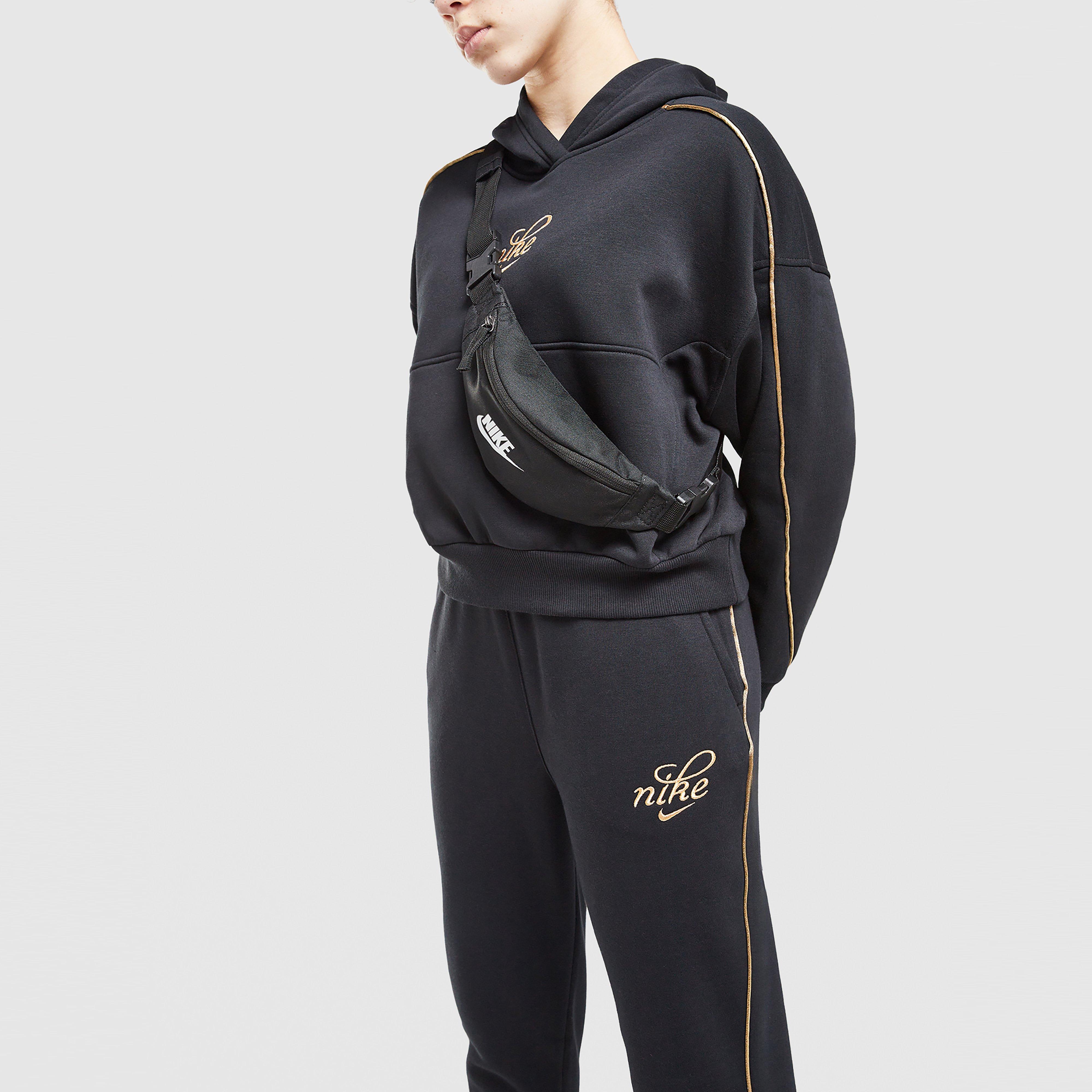 Pantaloni pentru copii NIKE PANTALONI  G NSW CLUB FLC OS JGGR GX SHNE