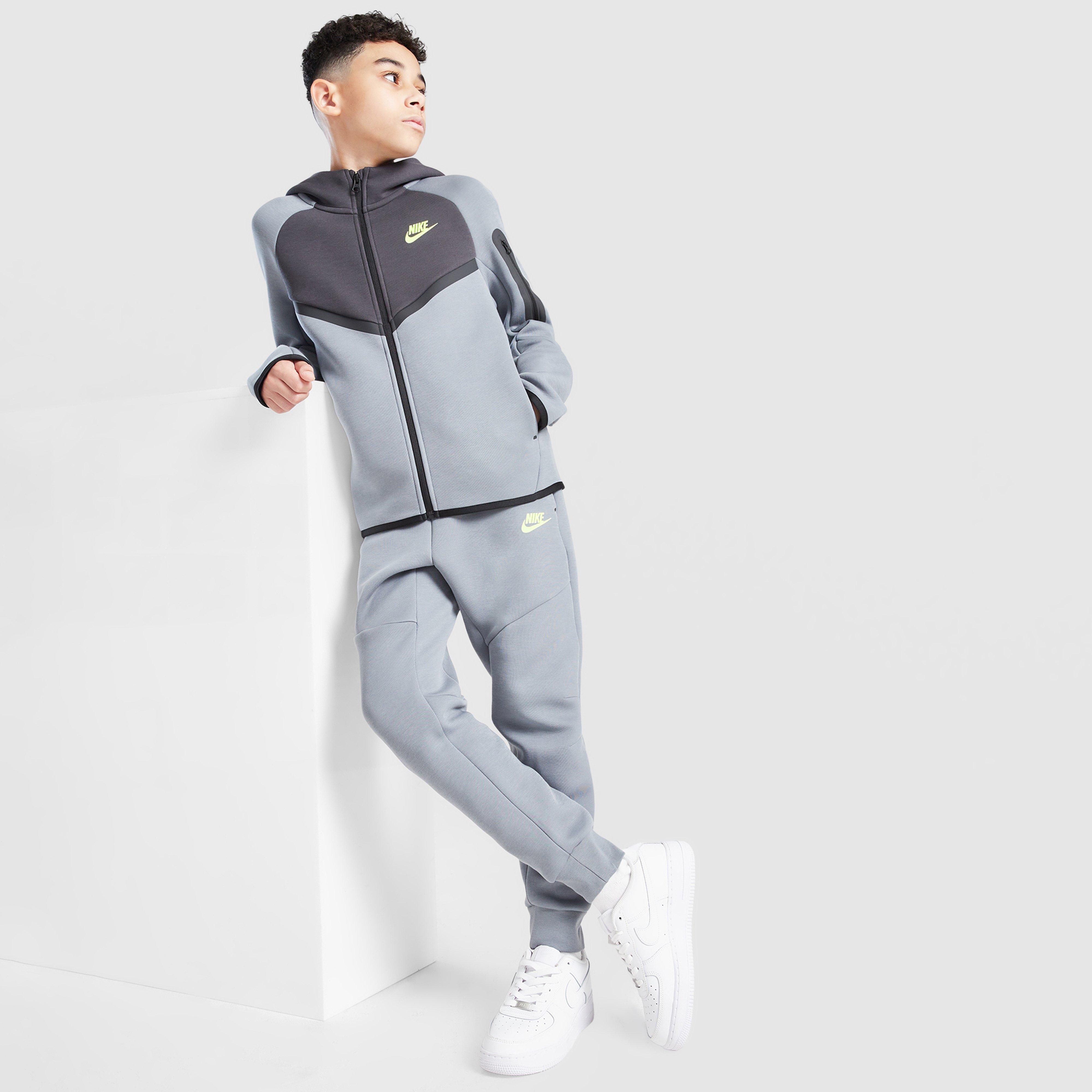 Detské nohavice NIKE NOHAVICE  B NSW TCH FLC JGGR - PD