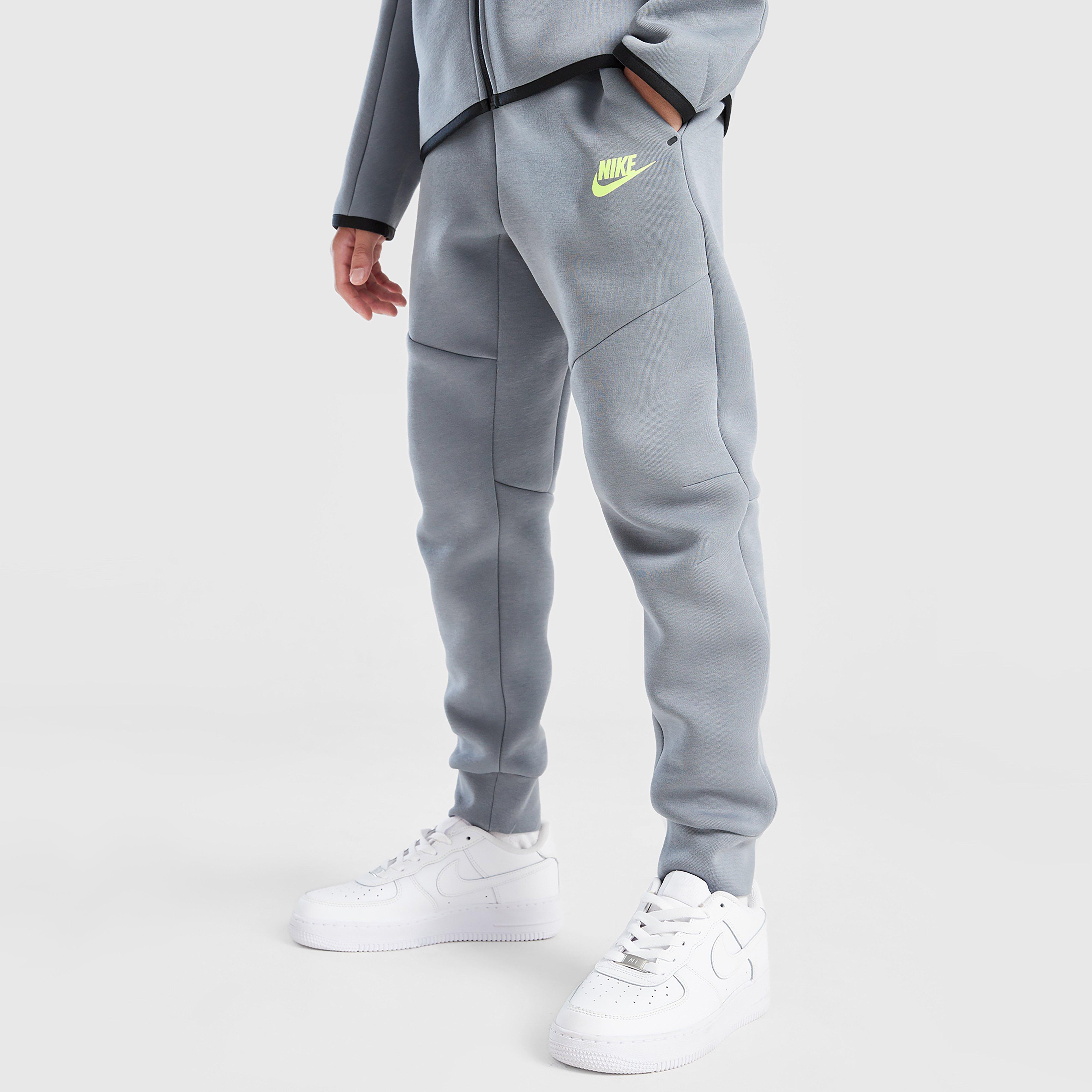 Detské nohavice NIKE NOHAVICE  B NSW TCH FLC JGGR - PD