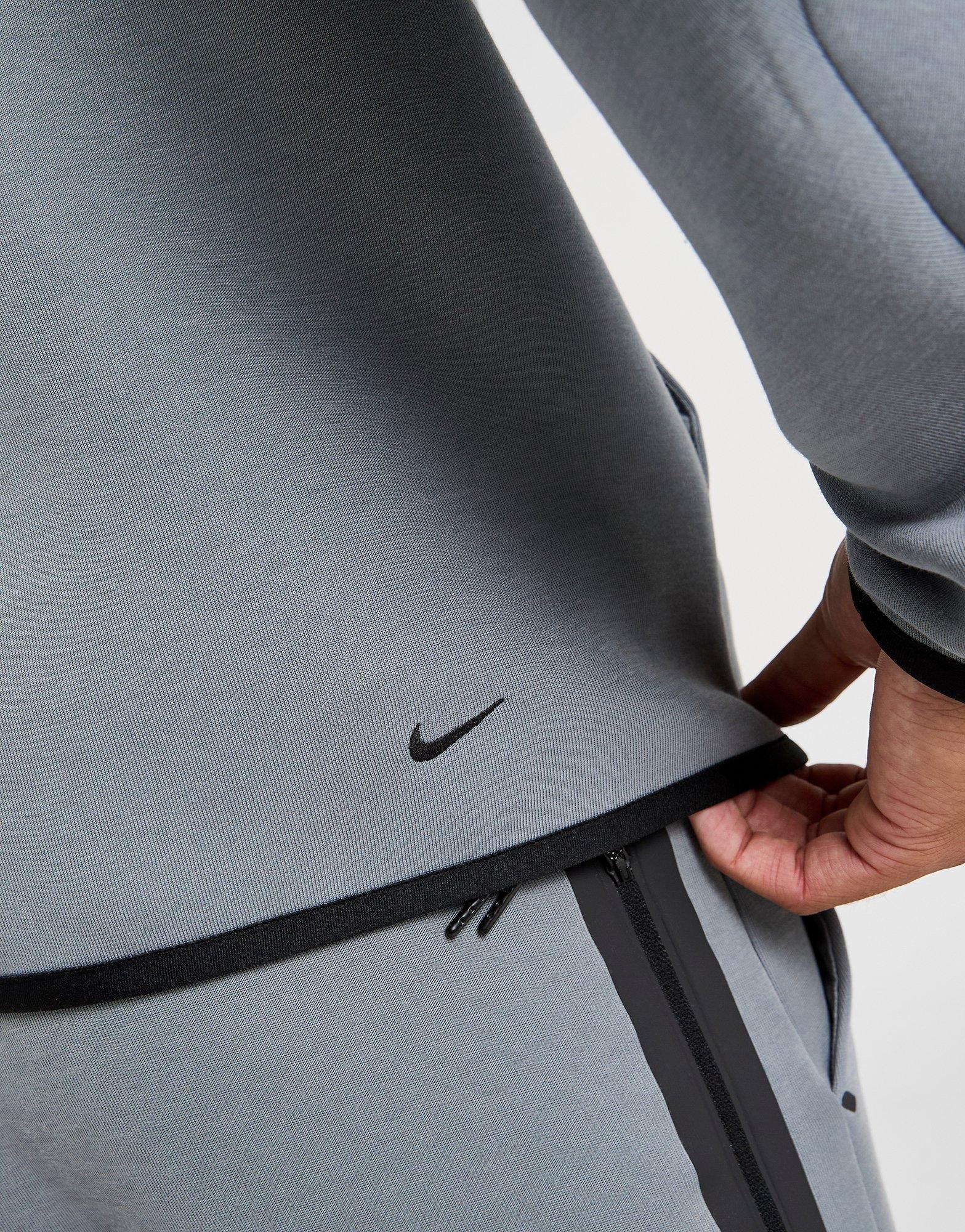 Чоловічі кофти NIKE КОФТА З КАПЮШОНОМ M NK TCH MIX WR HOODIE IH4302-065 Сірий