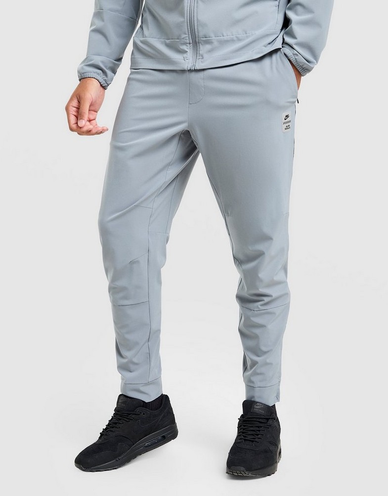 Pantaloni pentru bărbați NIKE PANTALONI  M NSW AIR MAX TC ST WVN PANT IF0385-065 Gri