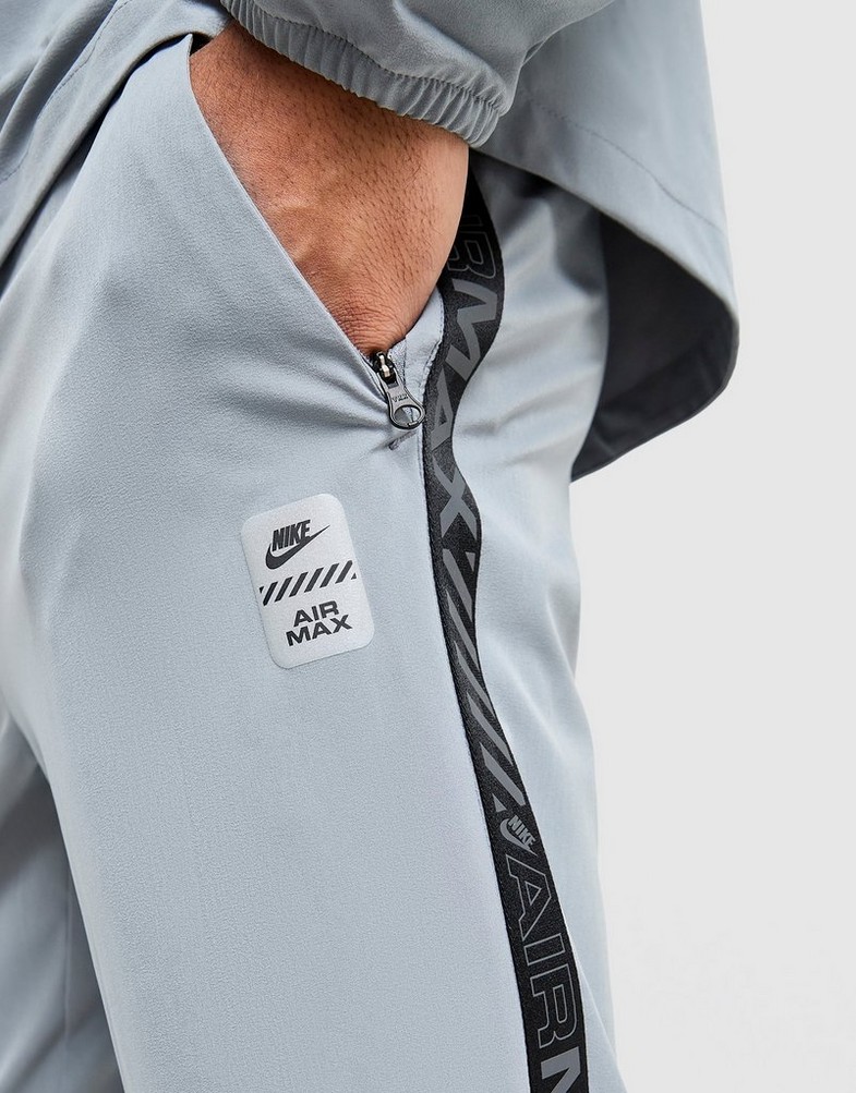Pantaloni pentru bărbați NIKE PANTALONI  M NSW AIR MAX TC ST WVN PANT IF0385-065 Gri