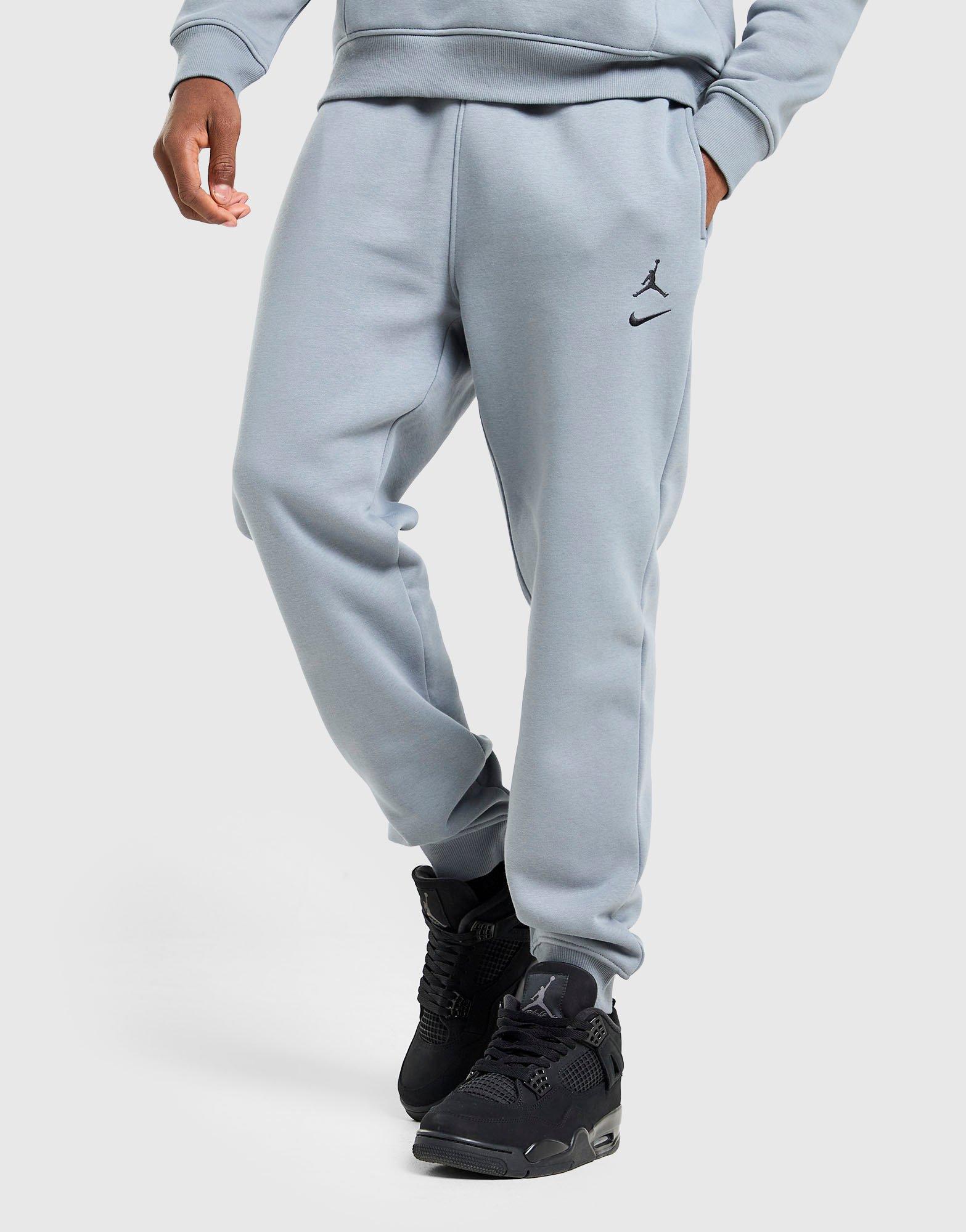Чоловічі штани JORDAN ШТАНИ M J BRK VARSITY FLC PANT BB IM1361-065 Сірий