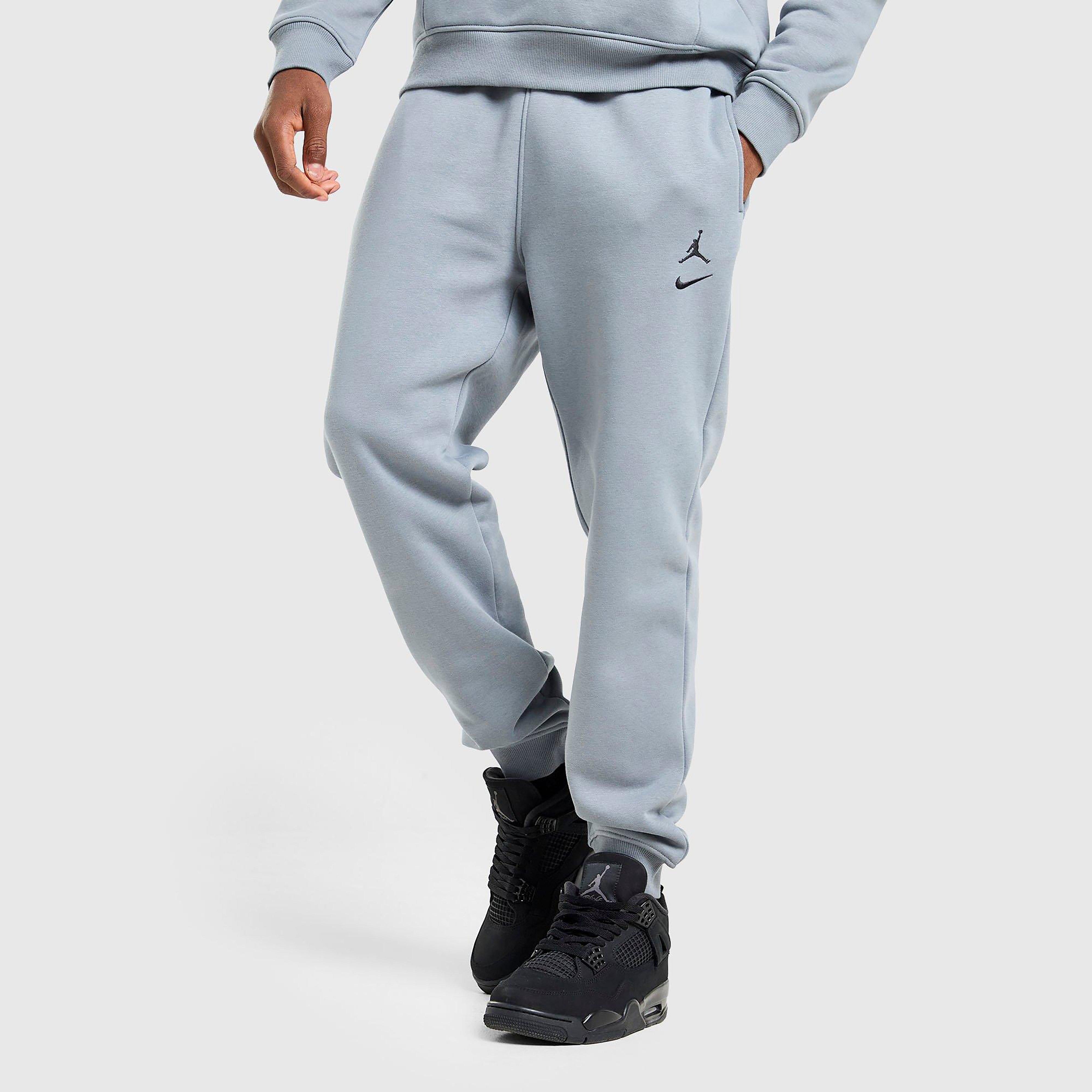 Férfi melegítőnadrág és jogger JORDAN NADRÁG M J BRK VARSITY FLC PANT BB
