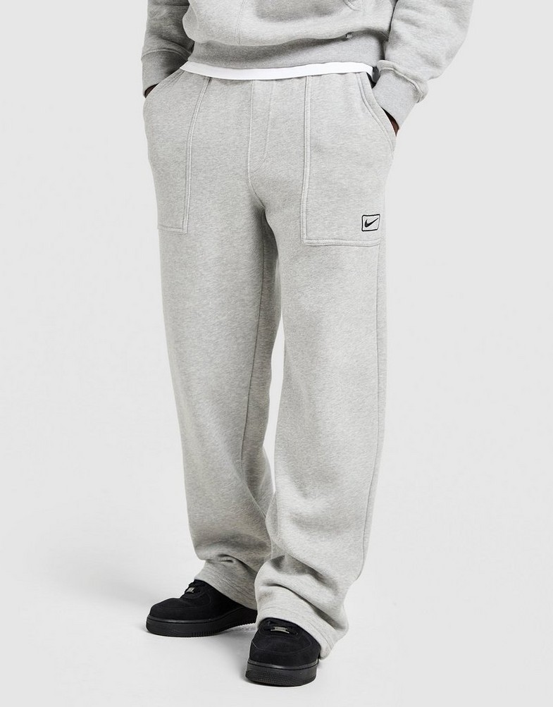 Pantaloni pentru bărbați NIKE PANTALONI  FLC WORKER JOGGER IQ2768-063 Gri