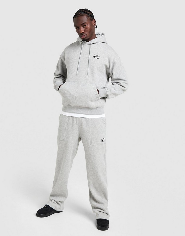 Pantaloni pentru bărbați NIKE PANTALONI  FLC WORKER JOGGER IQ2768-063 Gri