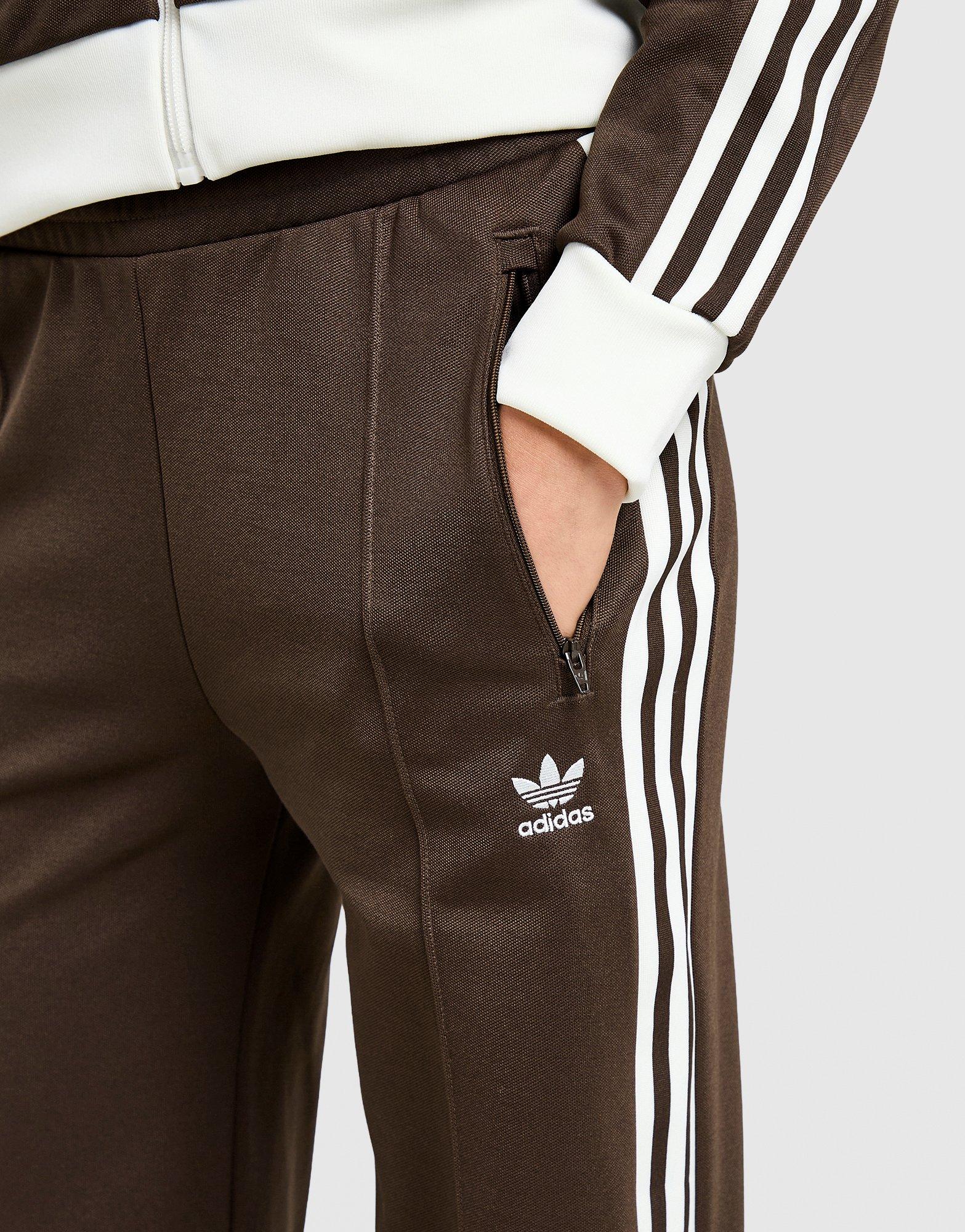 Pantaloni pentru femei ADIDAS PANTALONI  CLASSIC TP KH2342 Maro