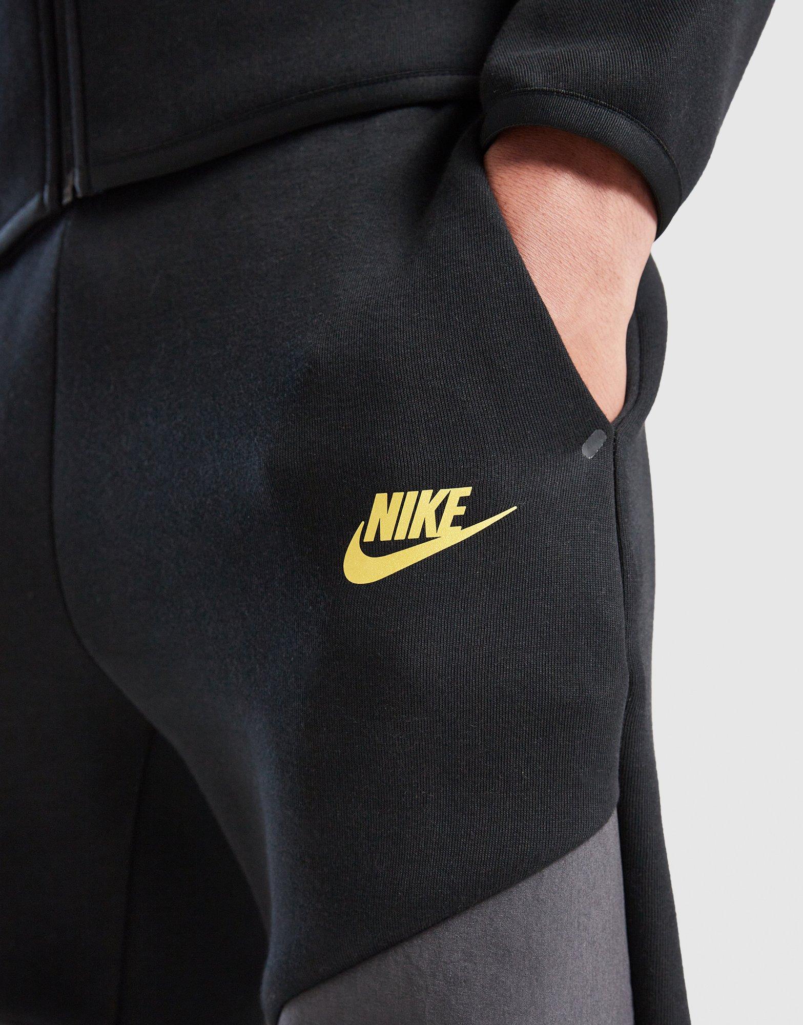 Nike Nohavice  Nsw Tch Flc - Pd.