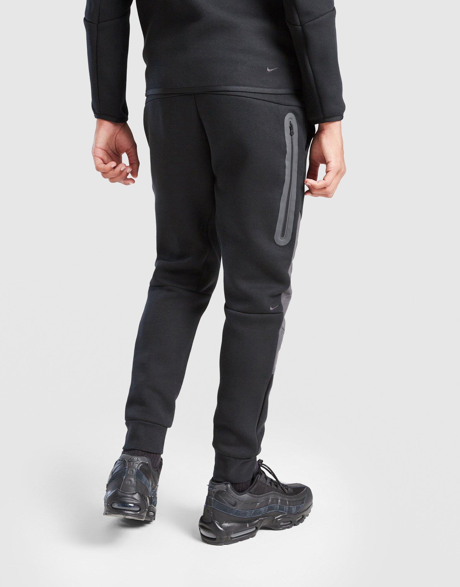 Nike Nohavice  Nsw Tch Flc - Pd.