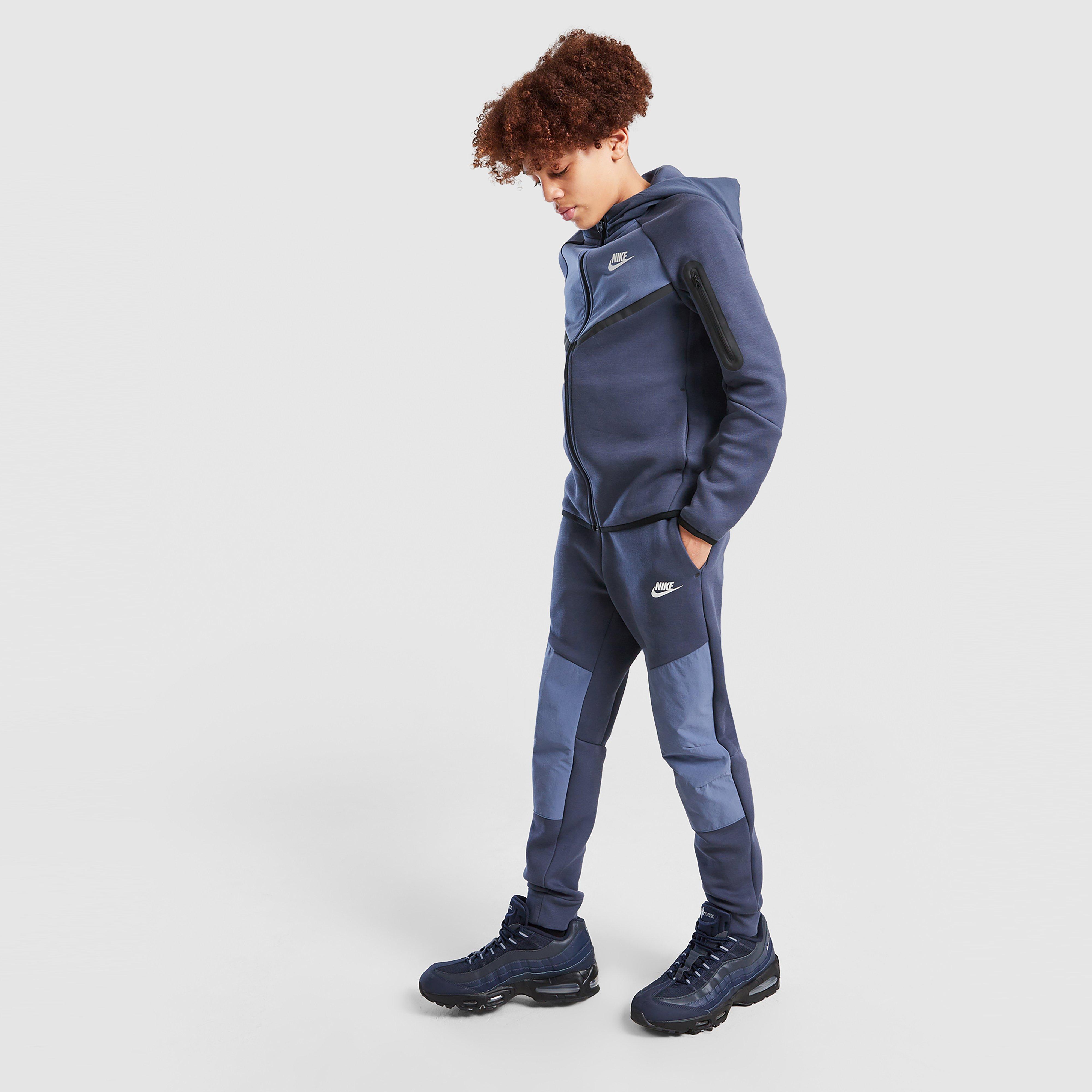 Detské nohavice NIKE NOHAVICE  B NSW TCH FLC JGGR - PD