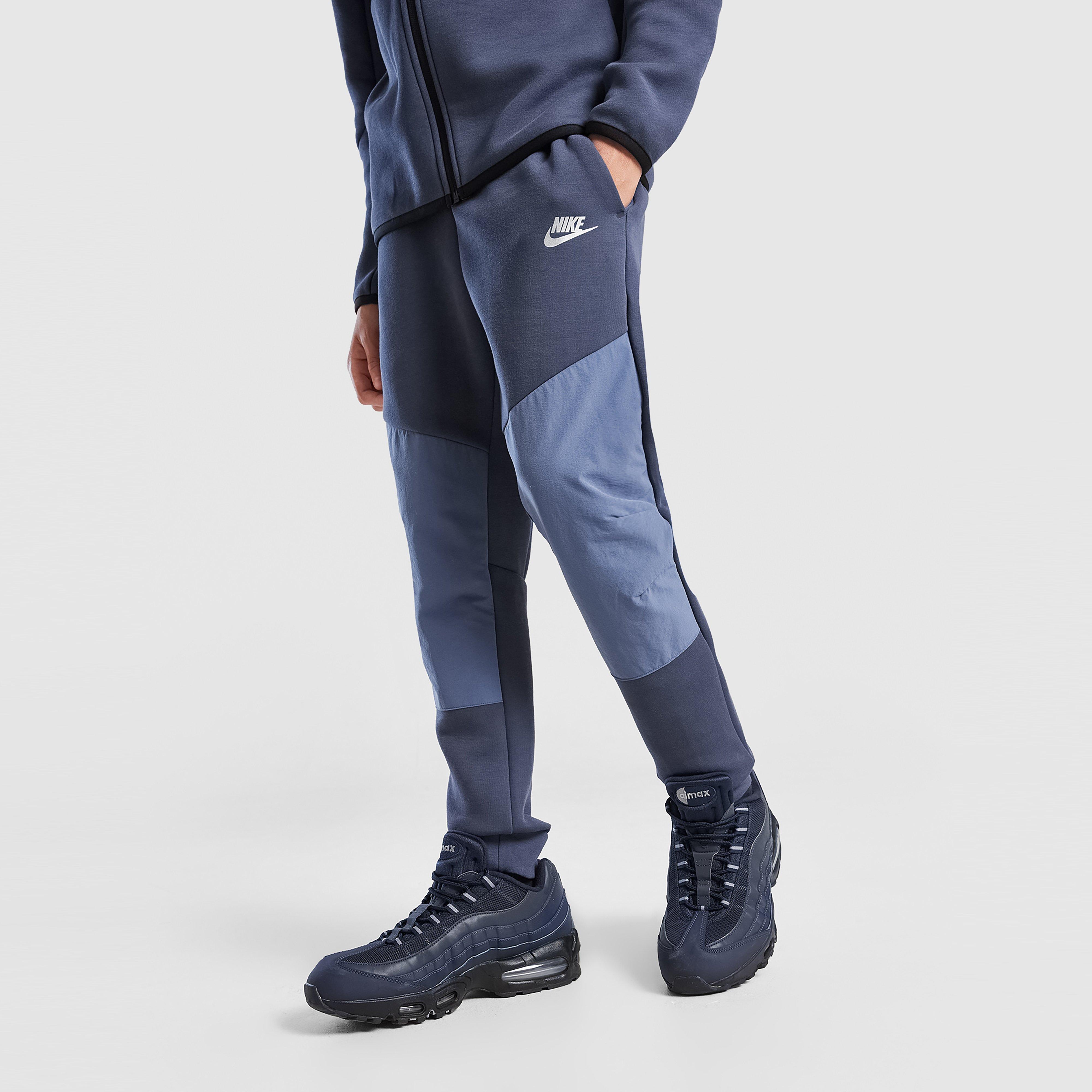 Detské nohavice NIKE NOHAVICE  B NSW TCH FLC JGGR - PD