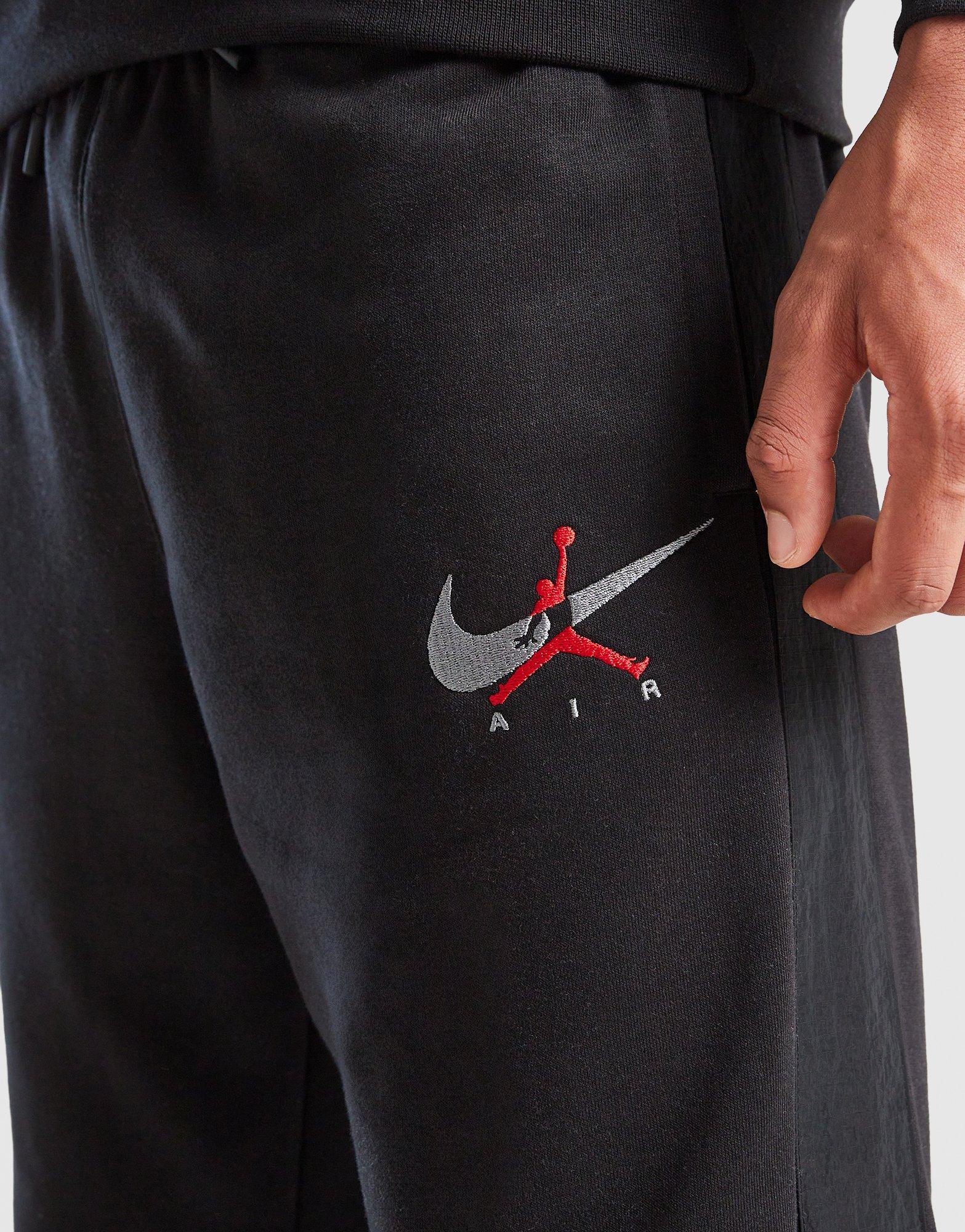 Gyerek melegítőszett JORDAN MELEGÍTŐ $ FLEECE WVN SUIT BLK 95F675-023 Fekete