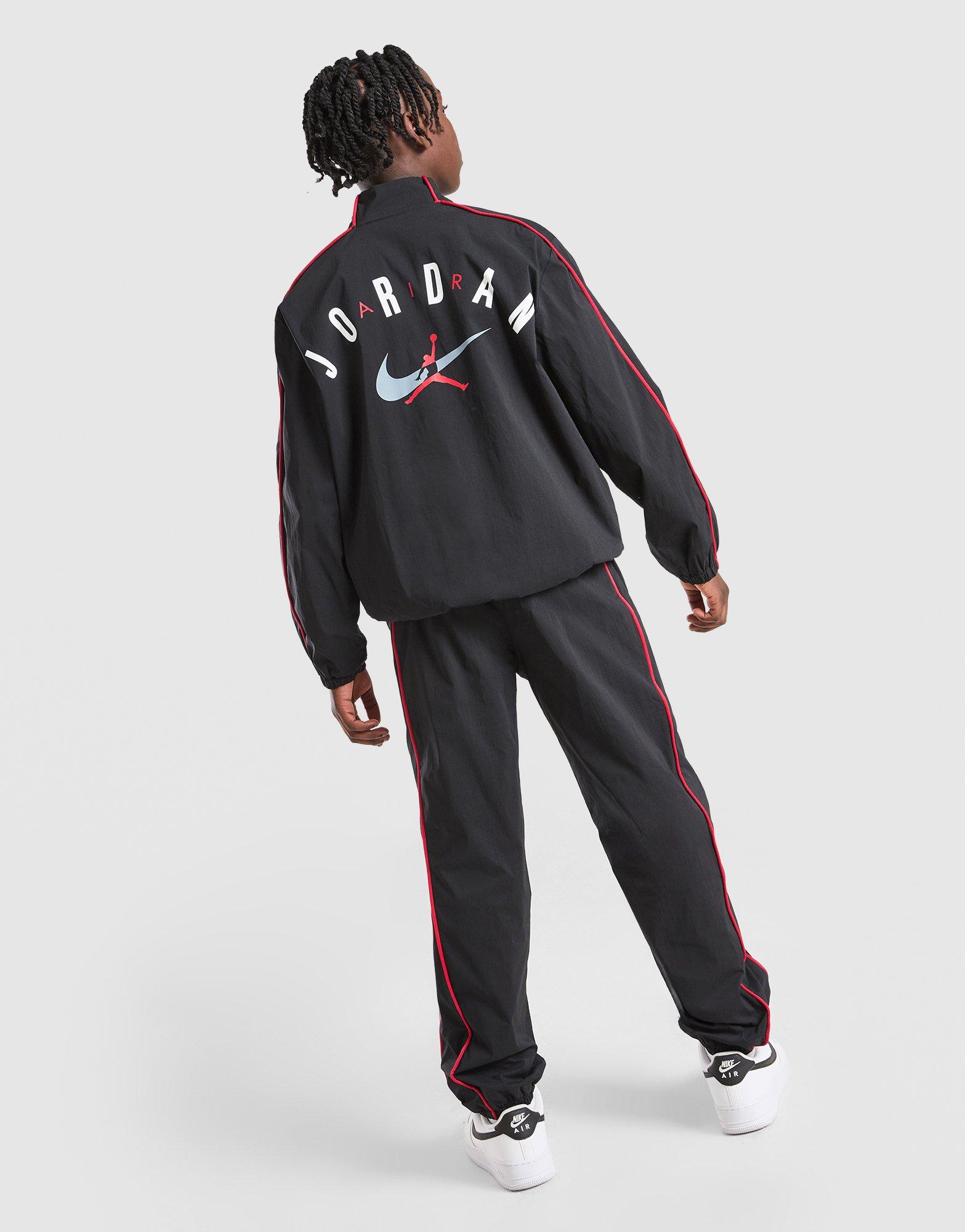 Gyerek melegítőszett JORDAN MELEGÍTŐ $ WOVEN ARCH SUIT BLK/RED 95F676-023 Fekete