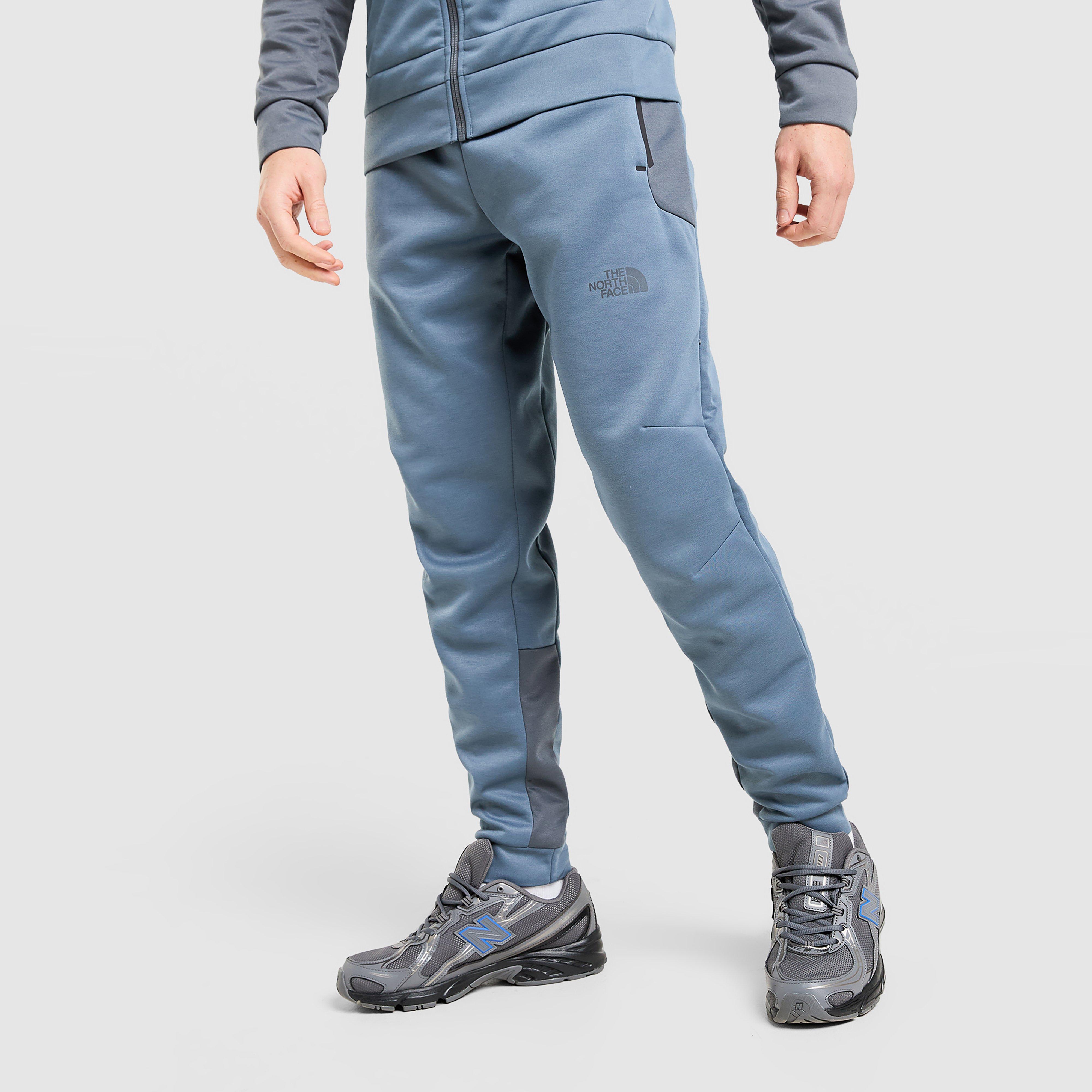 Pánske nohavice THE NORTH FACE NOHAVICE  M KAVEH JOGGER