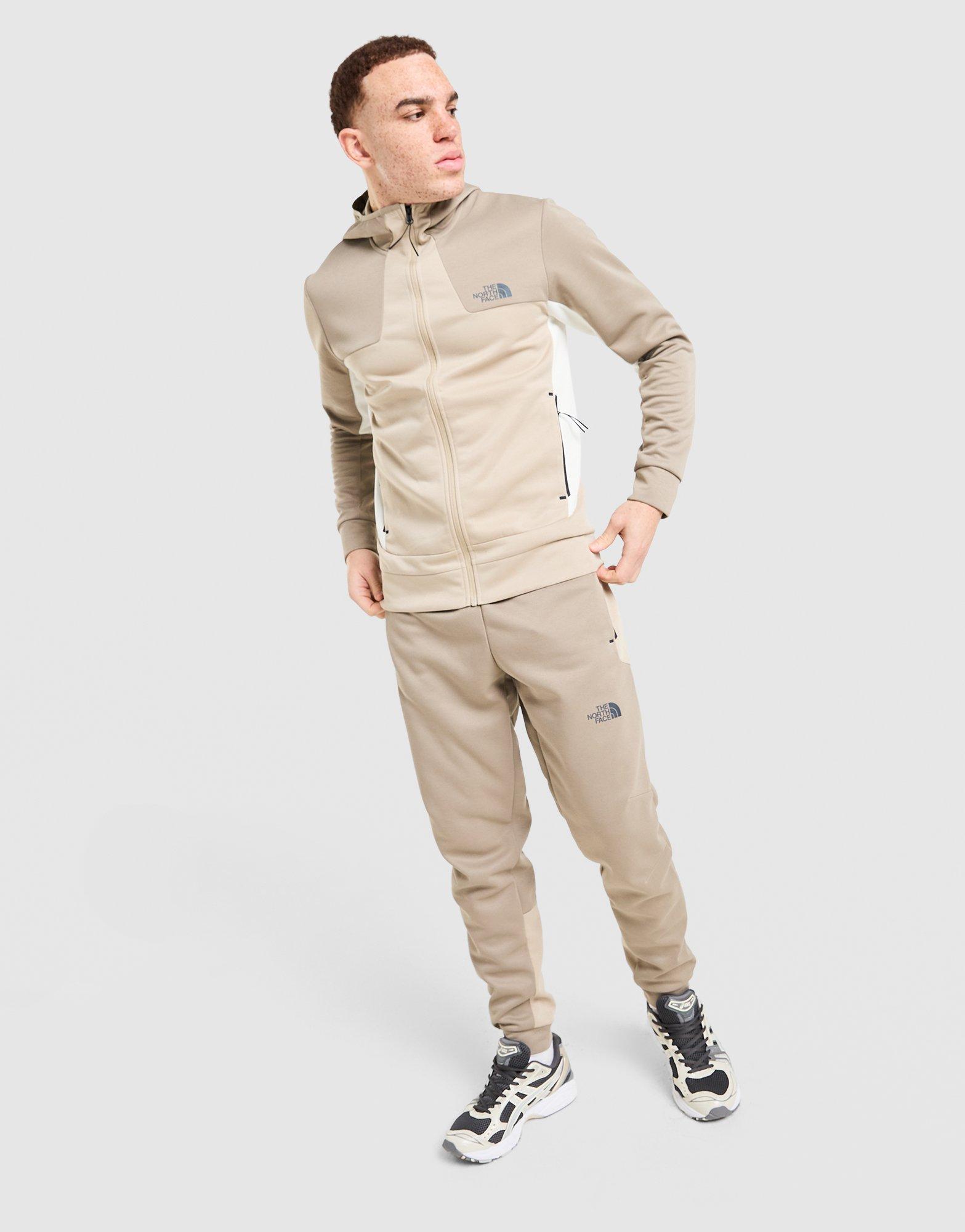 Pánske nohavice THE NORTH FACE NOHAVICE  M KAVEH JOGGER NF0A8HCF2Y11 Béžová