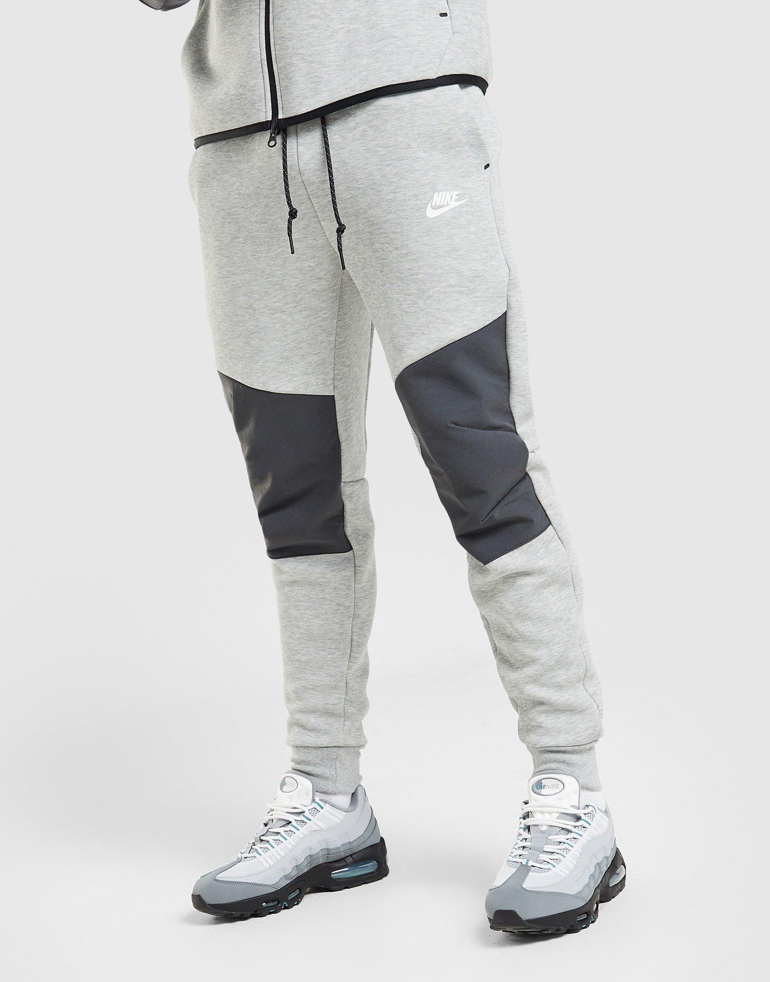 Pantaloni pentru bărbați NIKE PANTALONI  M NK TCH MIX JGGR IH4303-063 Gri
