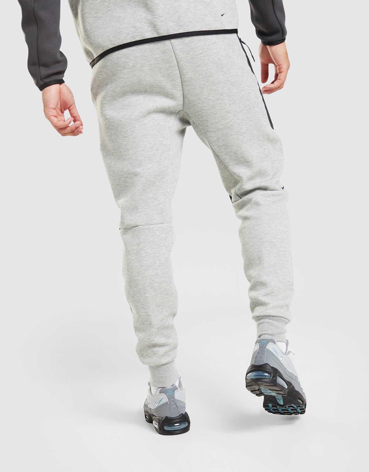 Pantaloni pentru bărbați NIKE PANTALONI  M NK TCH MIX JGGR IH4303-063 Gri