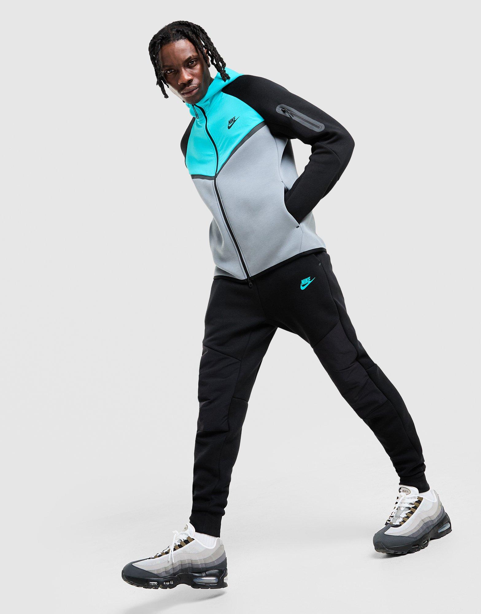 Pánske nohavice NIKE NOHAVICE  M NK TCH MIX JGGR IH4303-013 Čierna