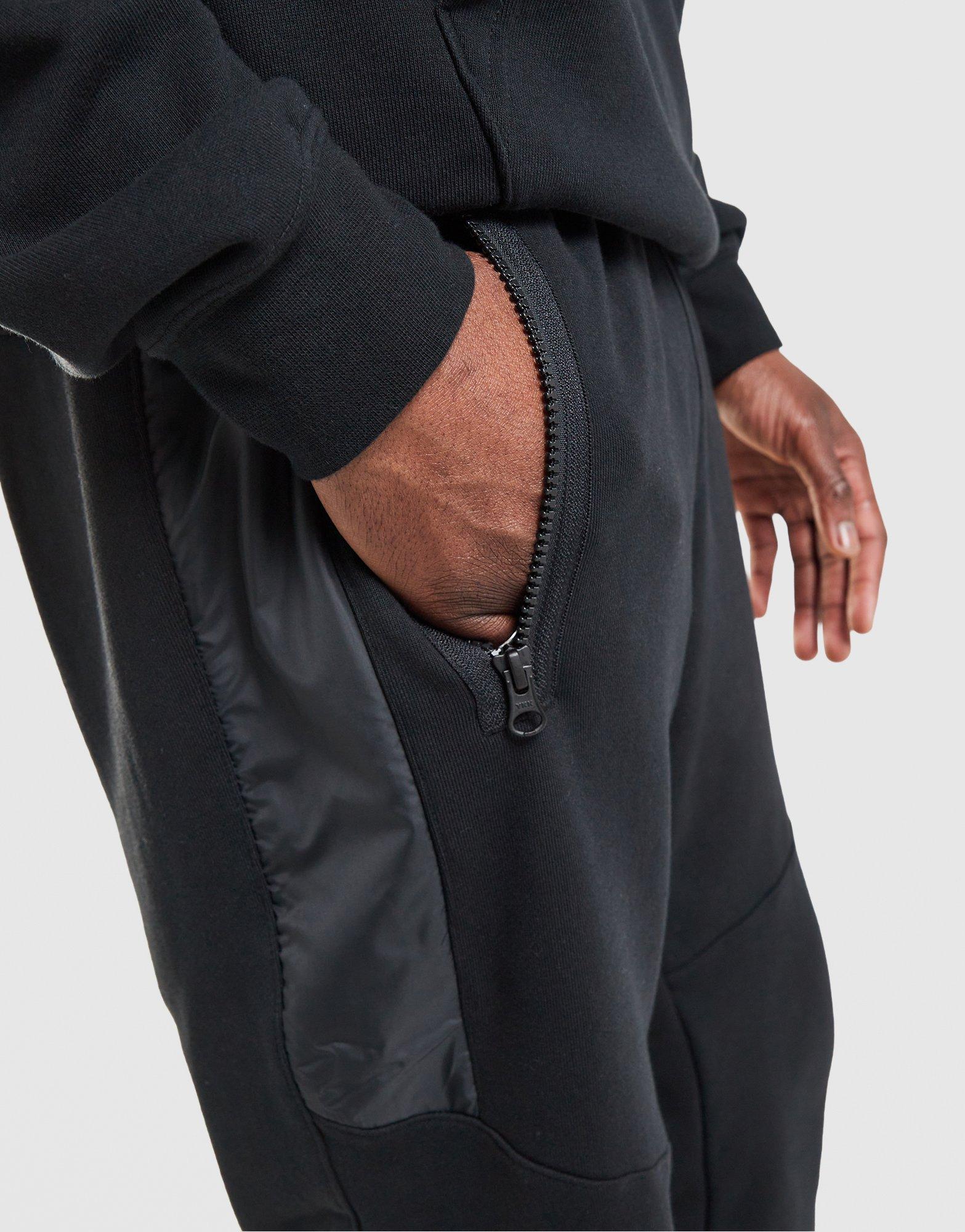 Pánske nohavice NIKE NOHAVICE  M NSW AIR MAX FLC JOGGER IO1063-010 Čierna