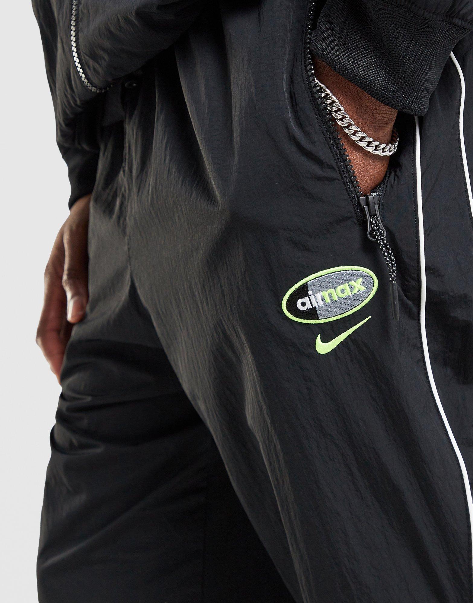 Pánske nohavice NIKE NOHAVICE  M NSW AIR MAX 95 WVN PANT IO3153-010 Čierna