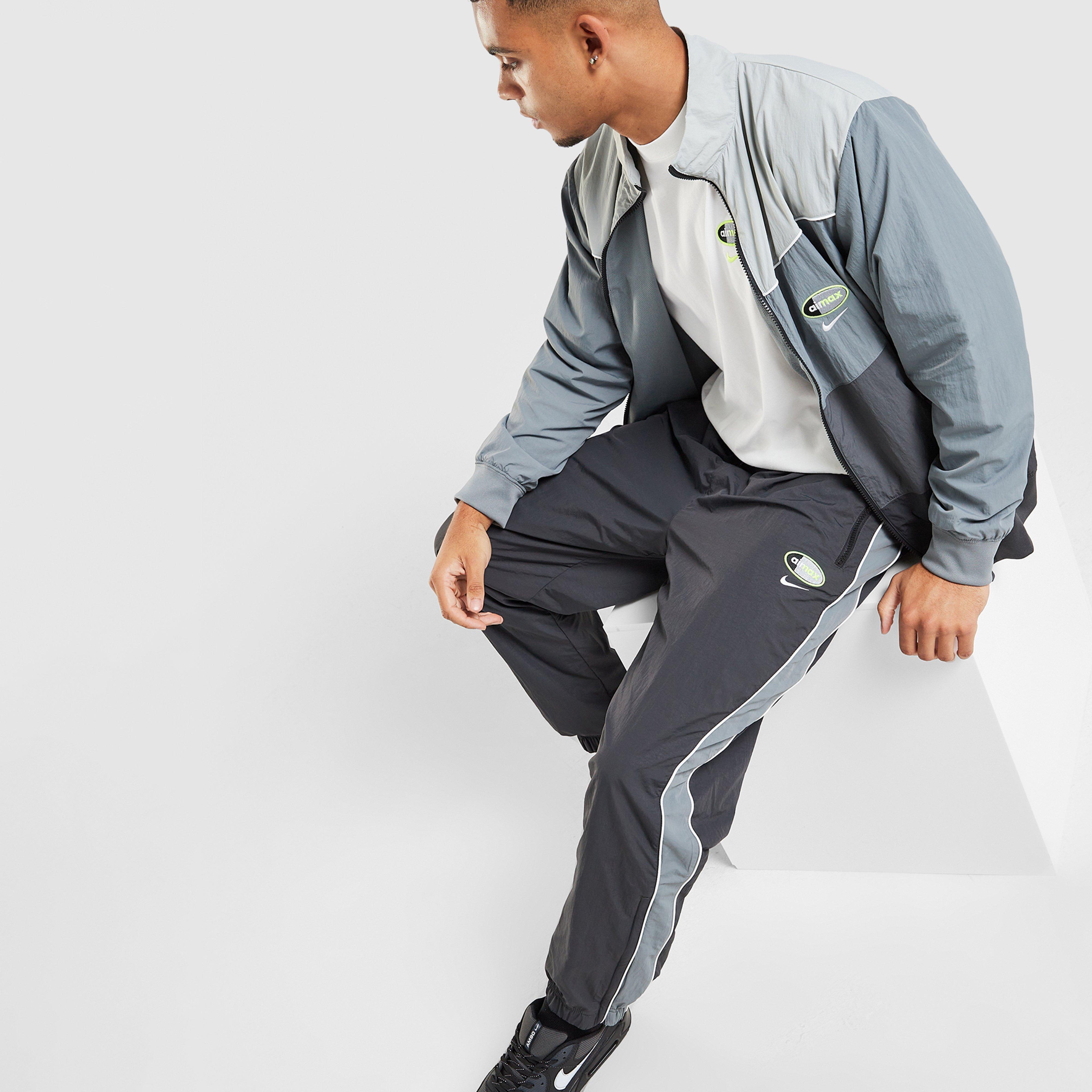 Pánské kalhoty NIKE KALHOTY  M NSW AIR MAX 95 WVN PANT