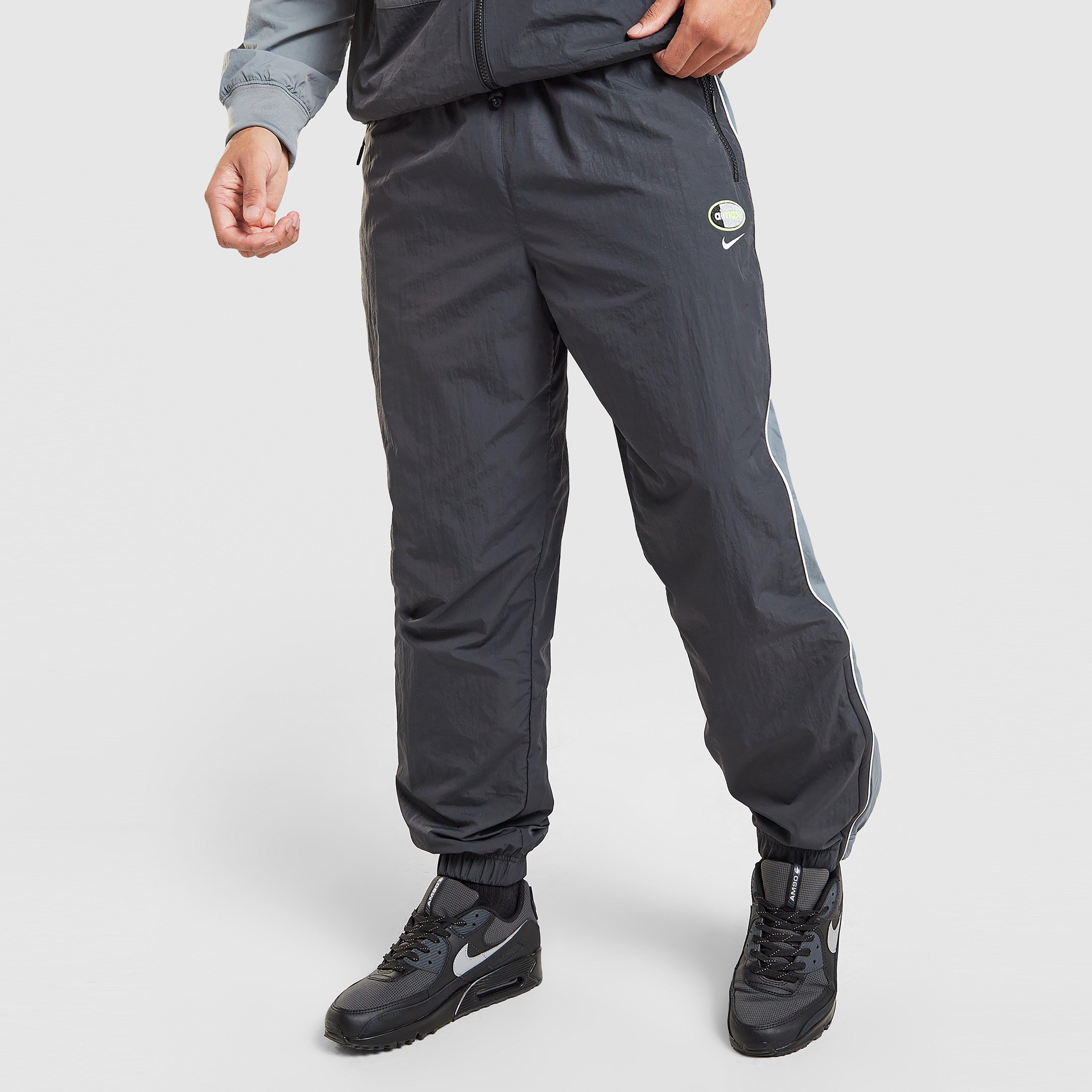 Pánské kalhoty NIKE KALHOTY  M NSW AIR MAX 95 WVN PANT