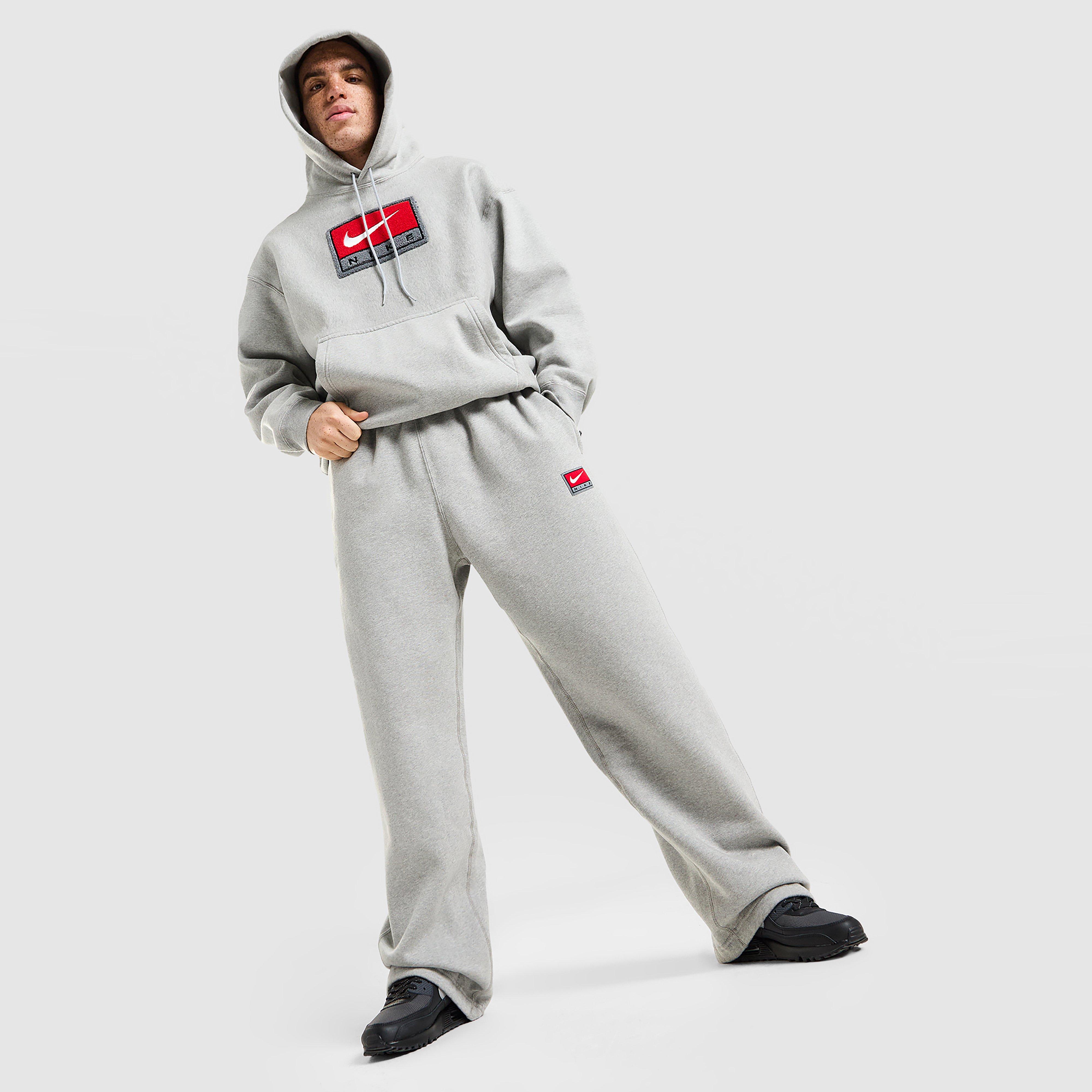 Чоловічі штани NIKE ШТАНИ M NL SOLO SWSH BB OH PANT GFX