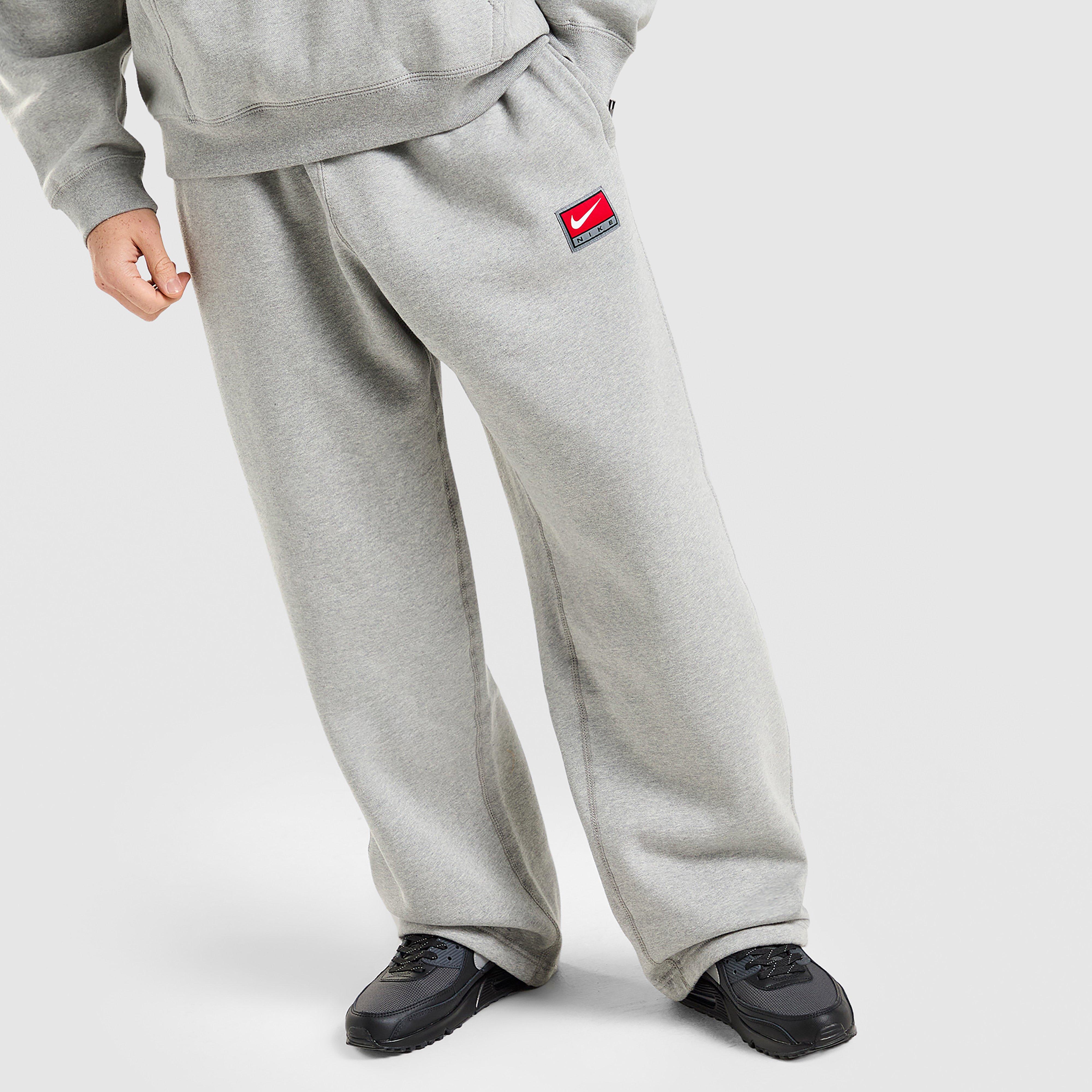 Чоловічі штани NIKE ШТАНИ M NL SOLO SWSH BB OH PANT GFX