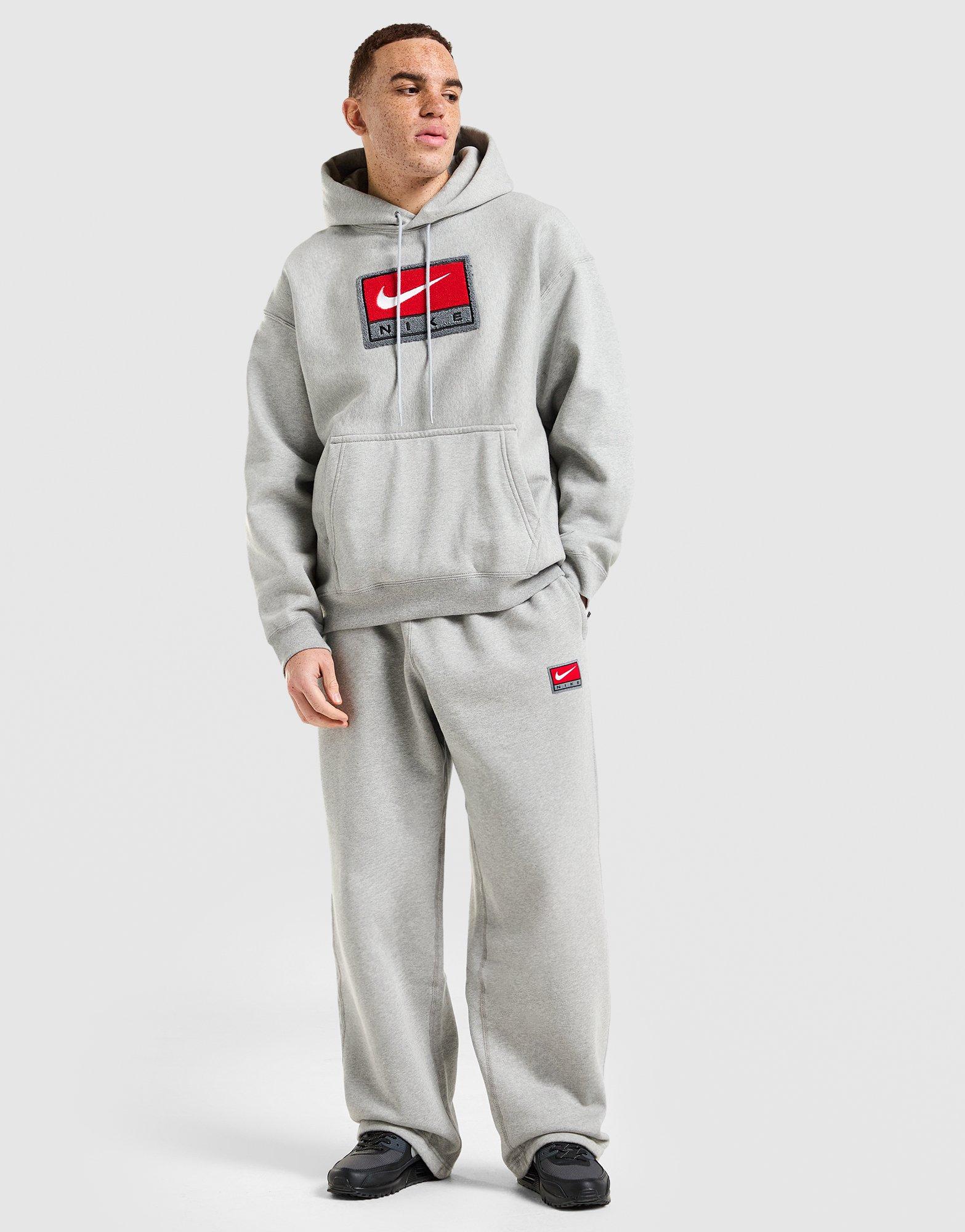 Pánske nohavice NIKE NOHAVICE  M NL SOLO SWSH BB OH PANT GFX IO0675-063 Sivá