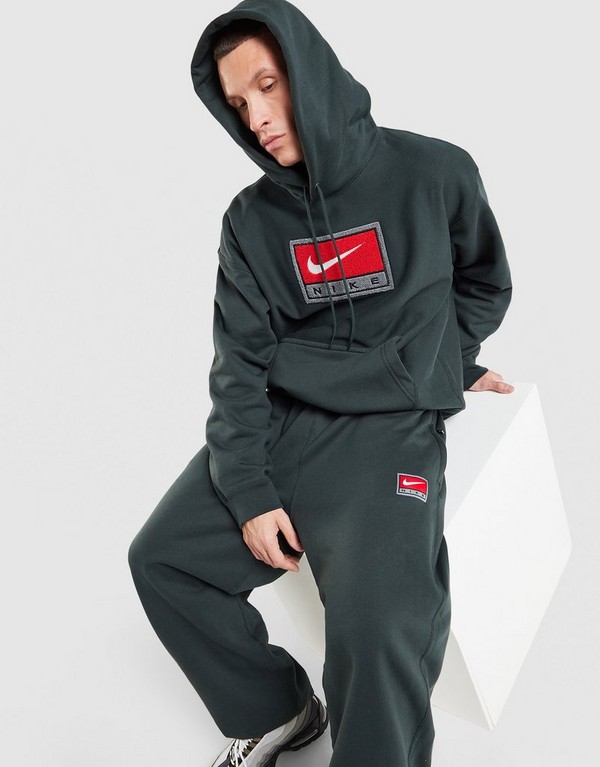 Nike Nohavice Nl Solo Swsh Bb Oh Gfx