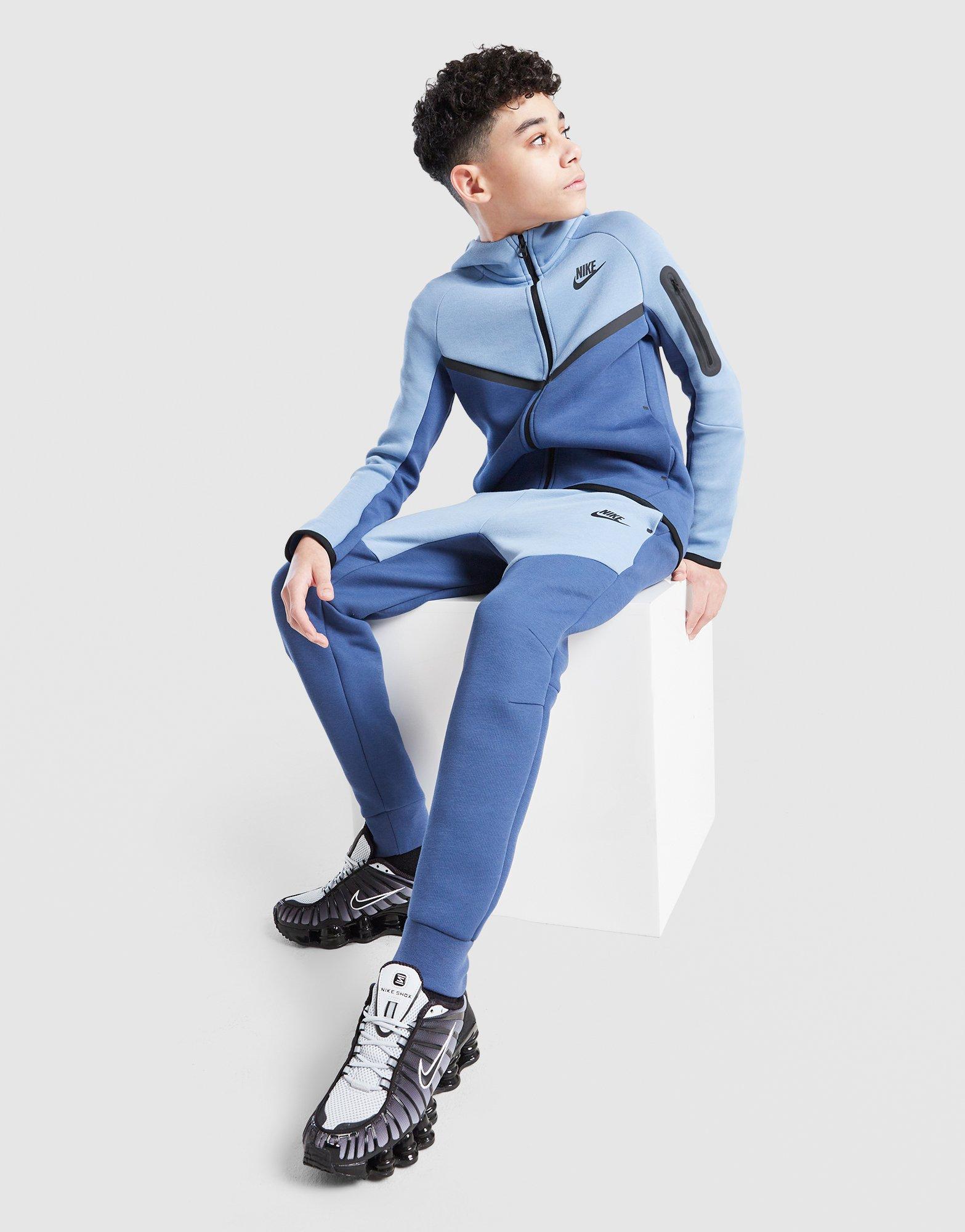 NIKE SPODNIE B NSW TCH FLC JGGR - PD HV5869-461 Niebieski