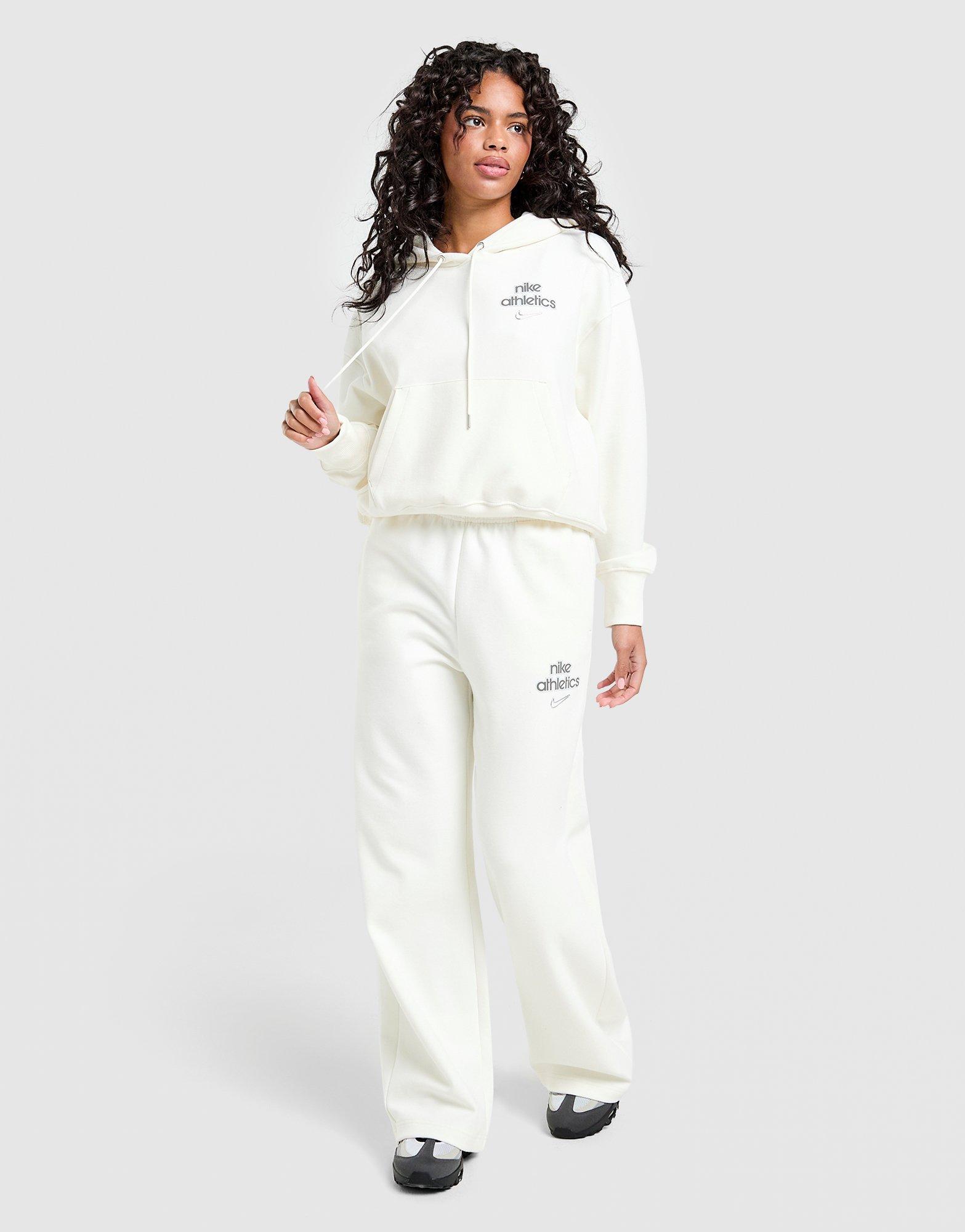 Dámske nohavice NIKE NOHAVICE  W NK PHNX FLC HR PANT WD GLS IO1297-133 Béžová