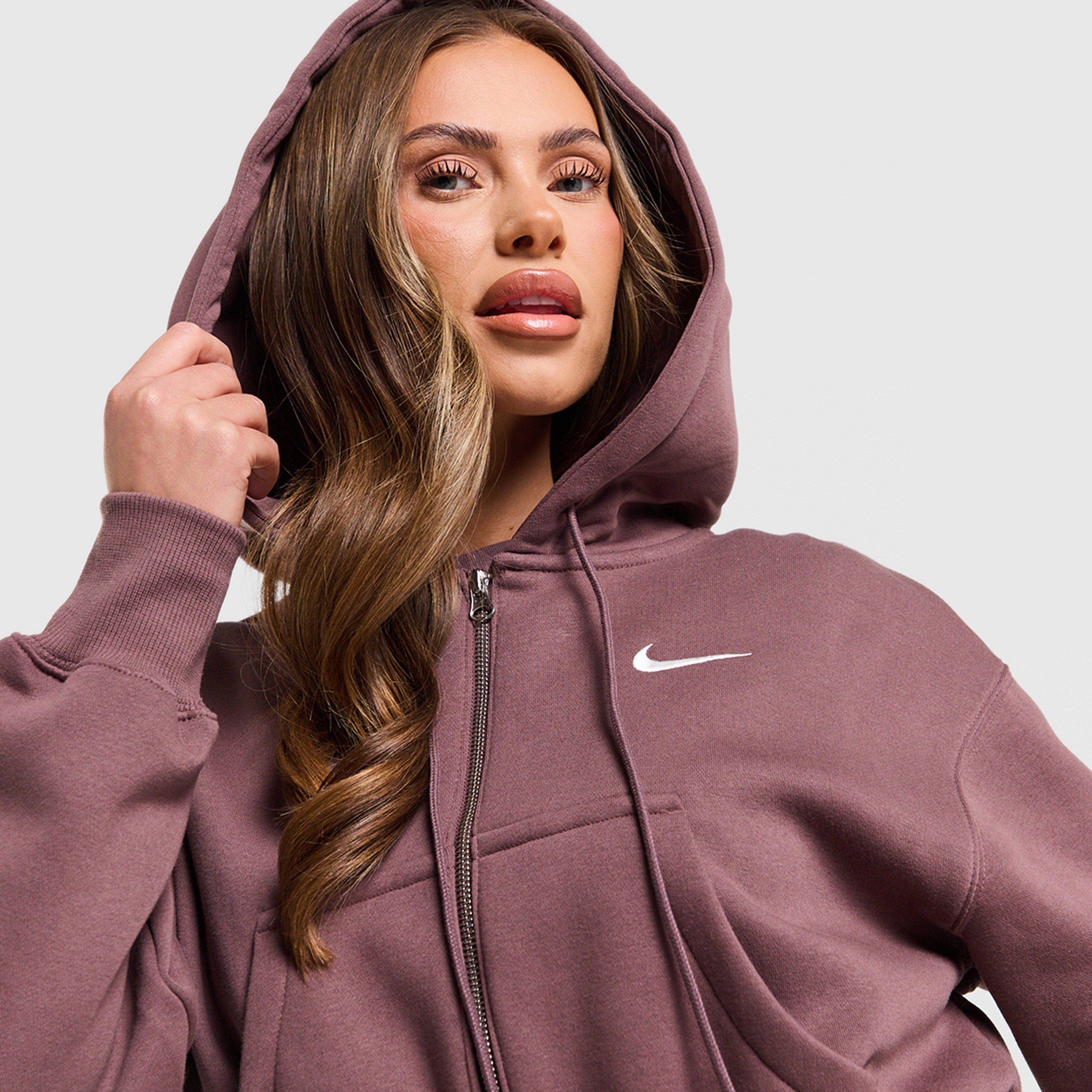 Жіночі кофти NIKE КОФТА НА БЛИСКАВЦІ З КАПЮШОНОМ   W NSW PHNX FLC CRP