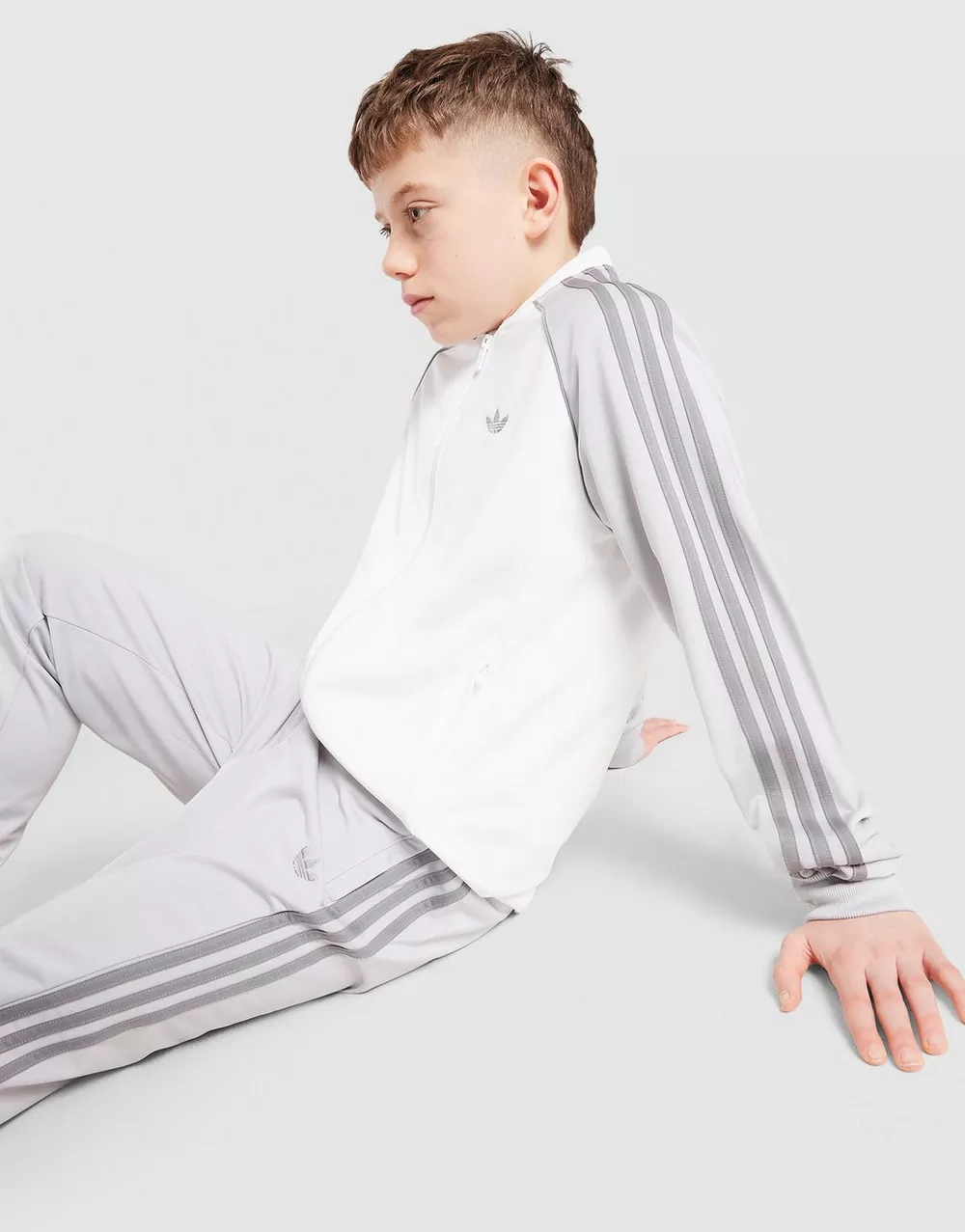 ADIDAS КОФТА НА БЛИСКАВЦІ SST TRACK ТОП, фото 1 з 5