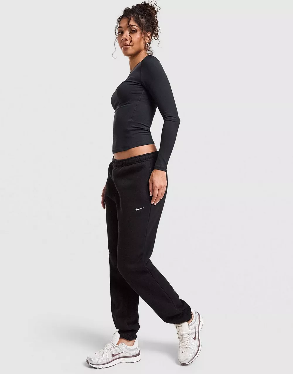 NIKE ШТАНИ W NK STDO FLC MW MR STD CF PNT, фото 1 з 4