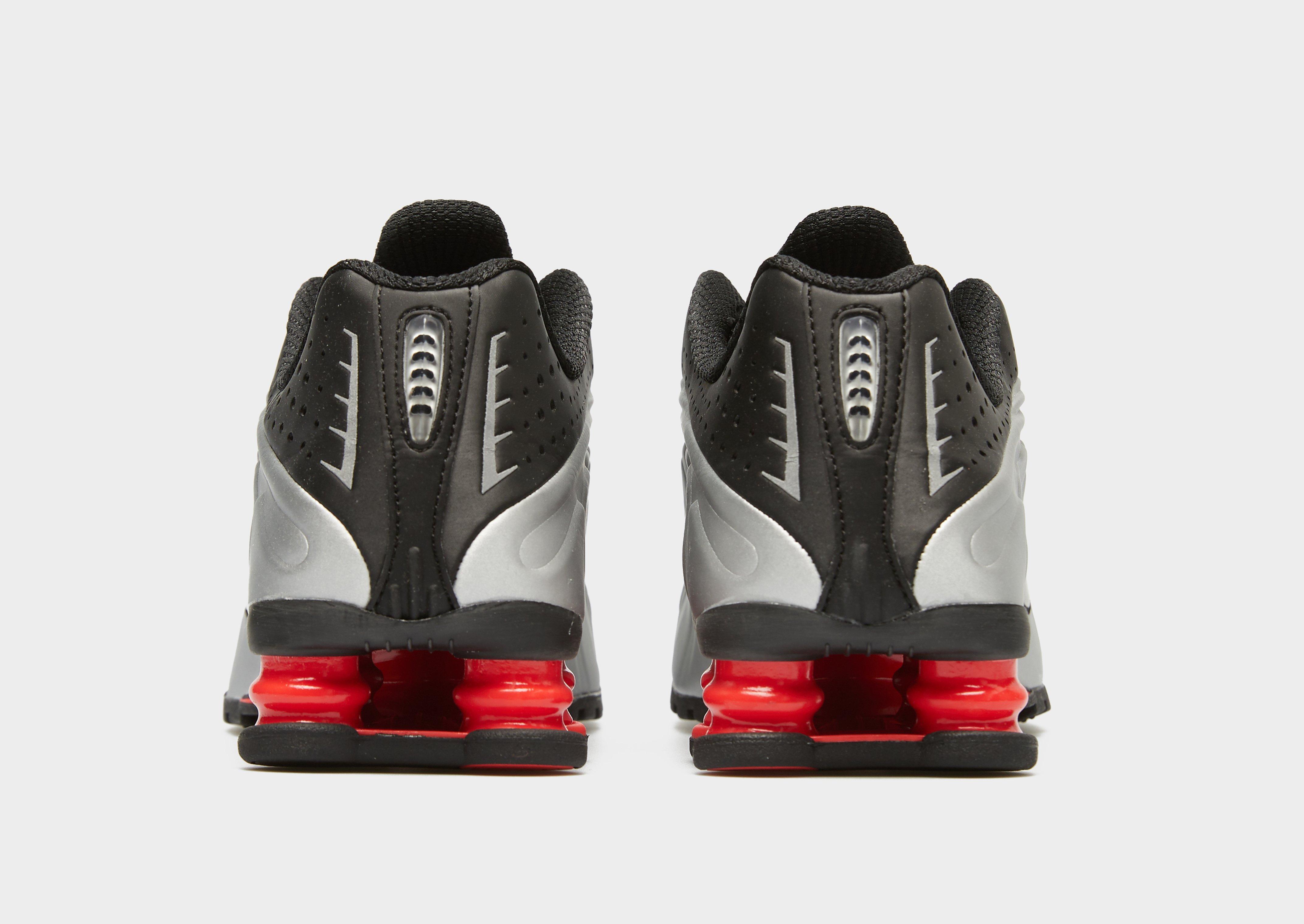 Жіночі кросівки NIKE W SHOX R4 AR3565-011 Чорний