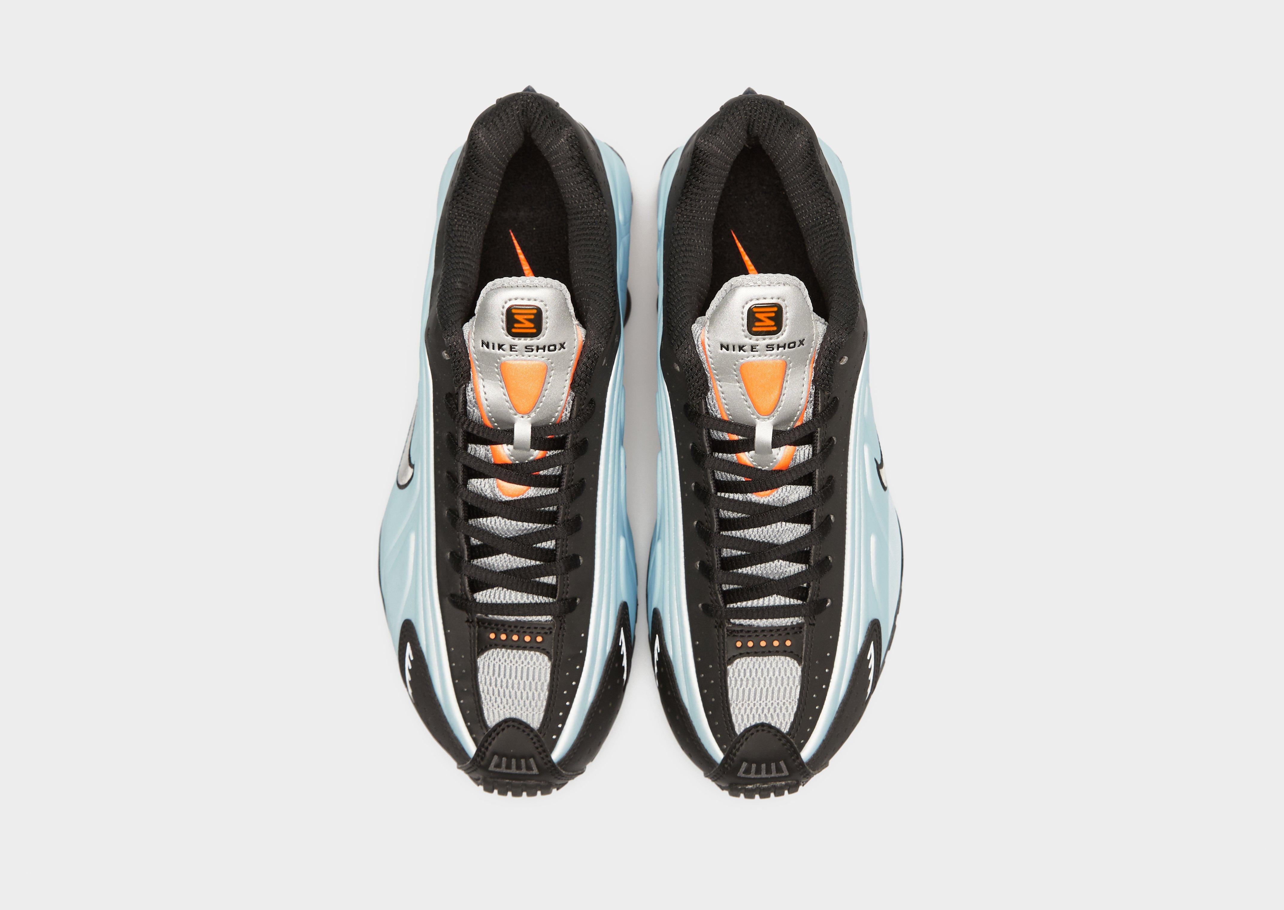 Жіночі кросівки W NIKE SHOX R4 AR3565-401 Блакитний