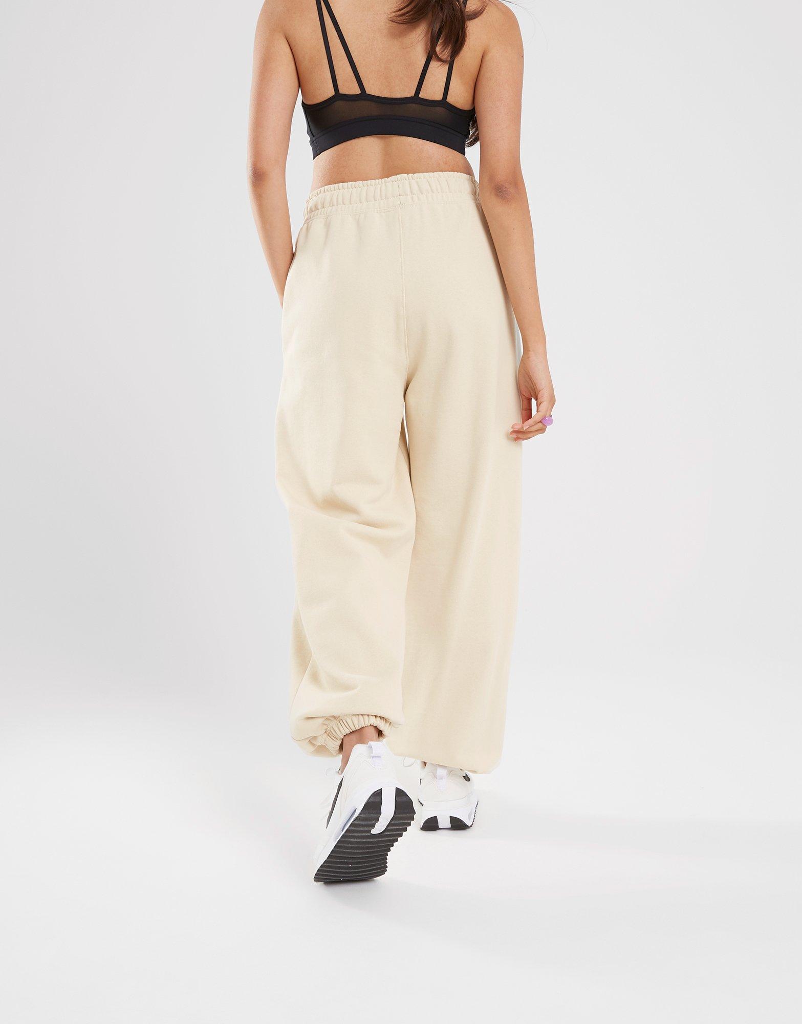 Дамски панталон ПАНТАЛОНИ W JORDAN FLT FLC PANT  DQ4607-234 Бежов