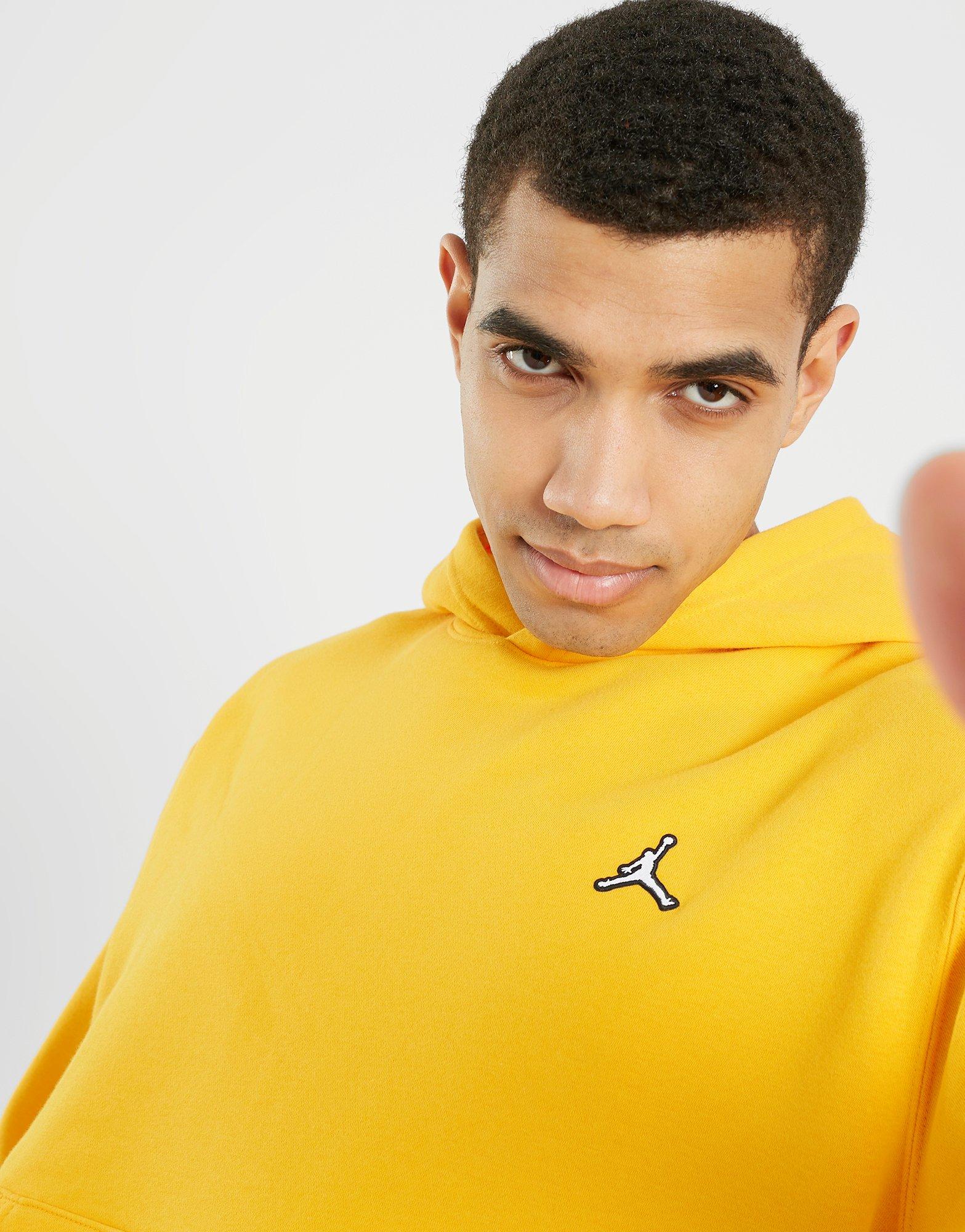 Férfi pulóverek JORDAN PULÓVER KAPUCNIS M J ESS FLC PO HOODIE DQ7466-705 Mustársárga