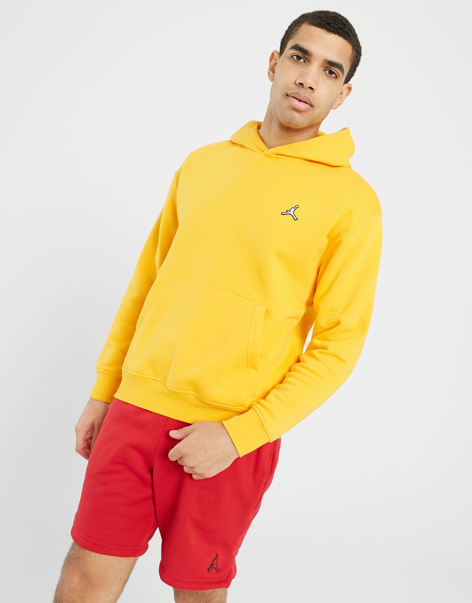 Férfi pulóverek JORDAN PULÓVER KAPUCNIS M J ESS FLC PO HOODIE DQ7466-705 Mustársárga