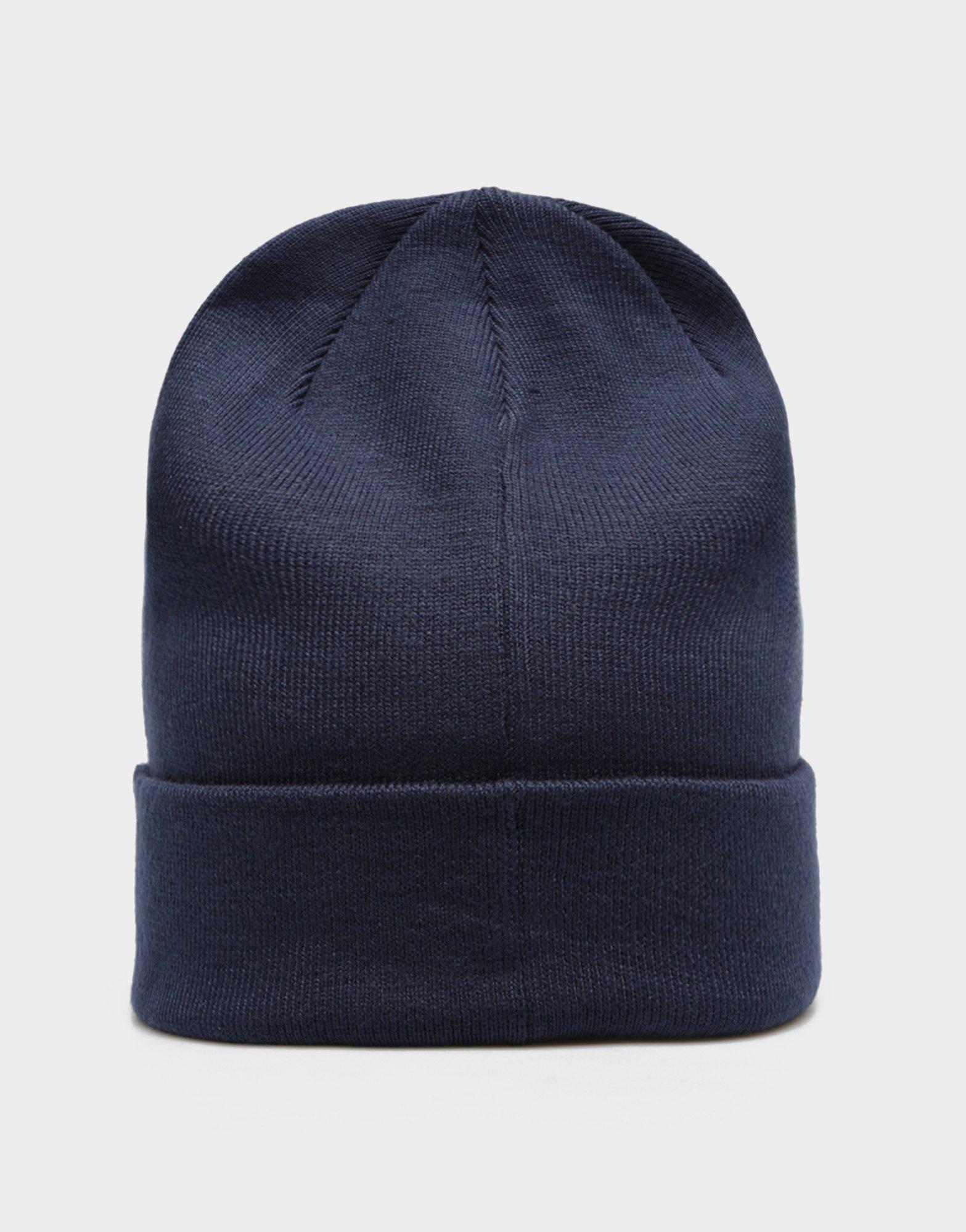 Dámska zimná čiapka NIKE ČIAPKA U NK PEAK BEANIE SC MTSWSH L FB6527-410 Tmavomodrá