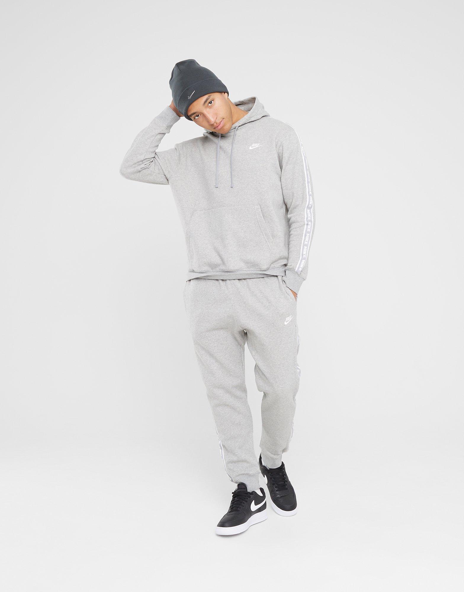 Vyriška sportiniai kostiumai NIKE TRENINGAS M NK CLUB FLC GX HD TRK SUIT FB7296-063 Pilka