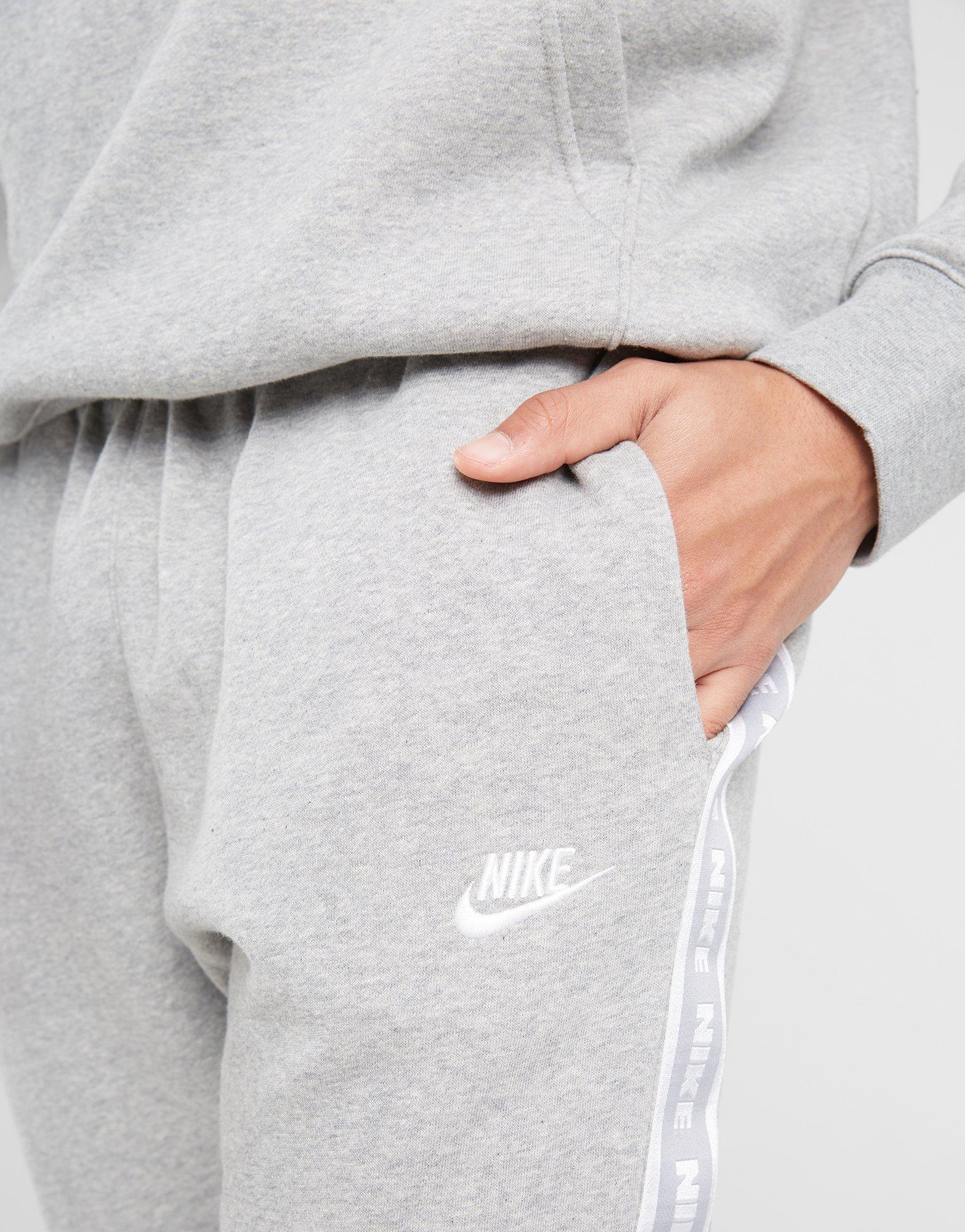 Vyriška sportiniai kostiumai NIKE TRENINGAS M NK CLUB FLC GX HD TRK SUIT FB7296-063 Pilka