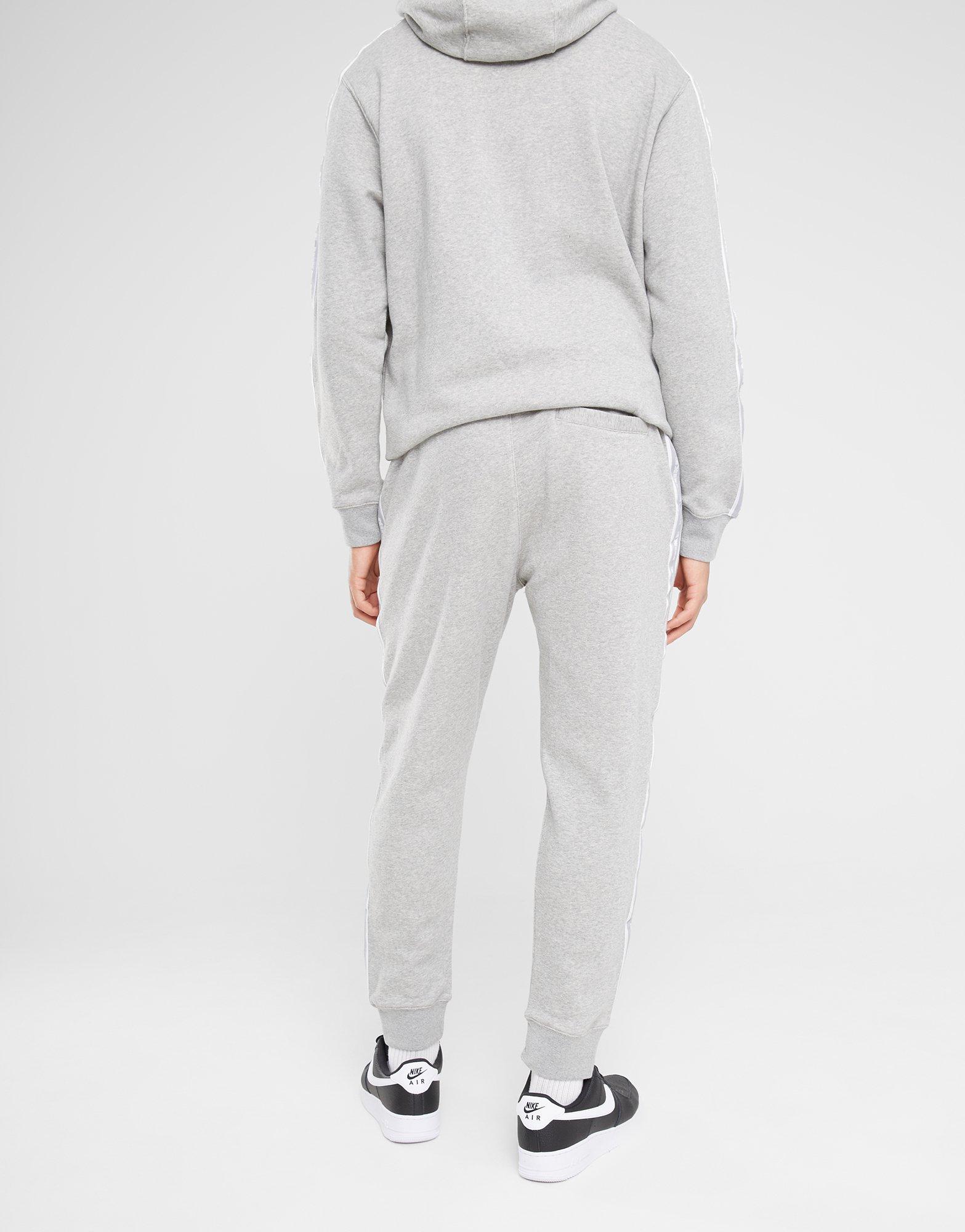Vyriška sportiniai kostiumai NIKE TRENINGAS M NK CLUB FLC GX HD TRK SUIT FB7296-063 Pilka