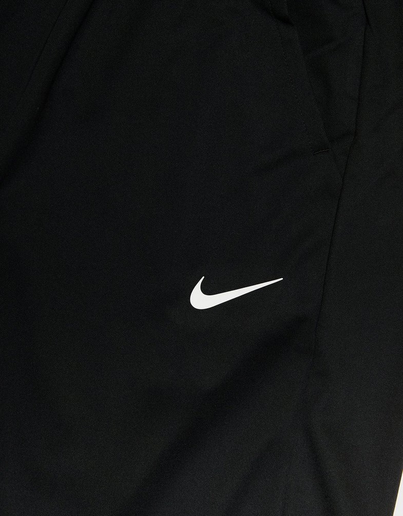 Pantaloni pentru bărbați NIKE PANTALONI  MEN'S DRI-FIT TAPERED VERSATILE FB7509-010 Negru