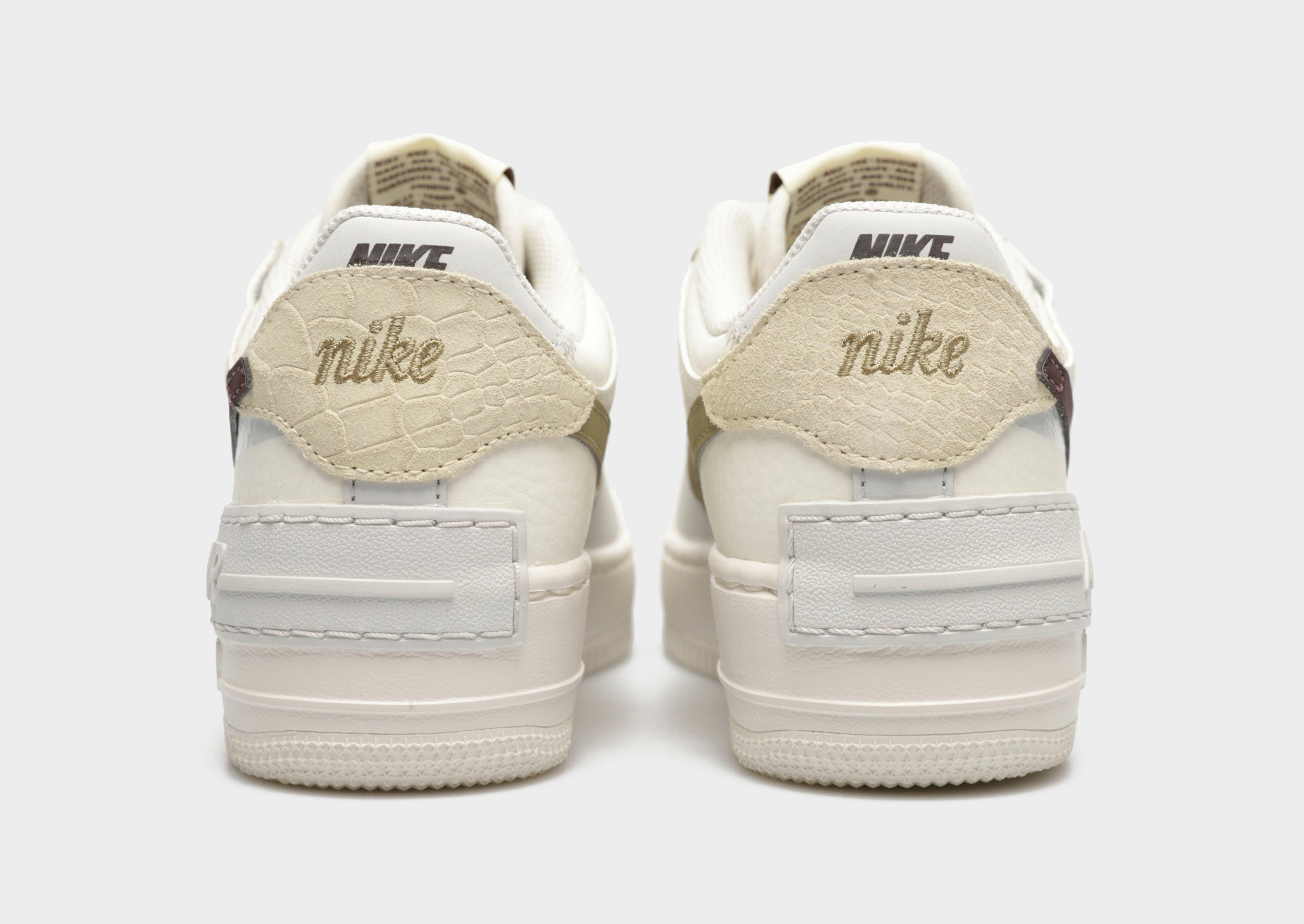 Kedai moterims NIKE AIR FORCE 1 SHADOW FD0804-100 Balta
