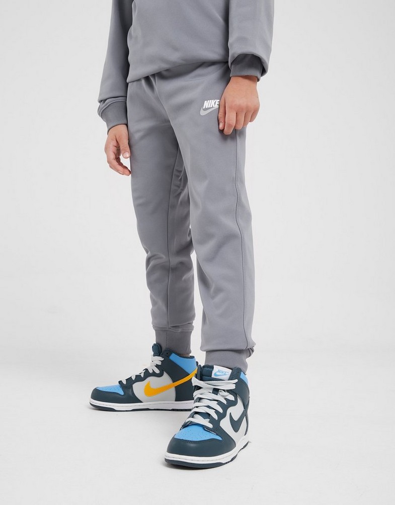 Дитячі спортивні костюми NIKE СПОРТИВНИЙ КОСТЮМ K NSW   TRACKSUIT POLY CREW HBR B FD3090-084 Сірий