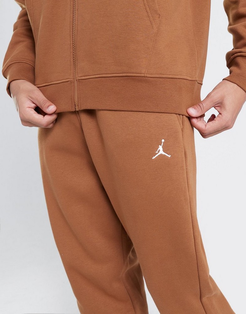 Pantaloni JORDAN PANTALONI M J ESS FLC FJ7779-281 • Maro • Bărbați