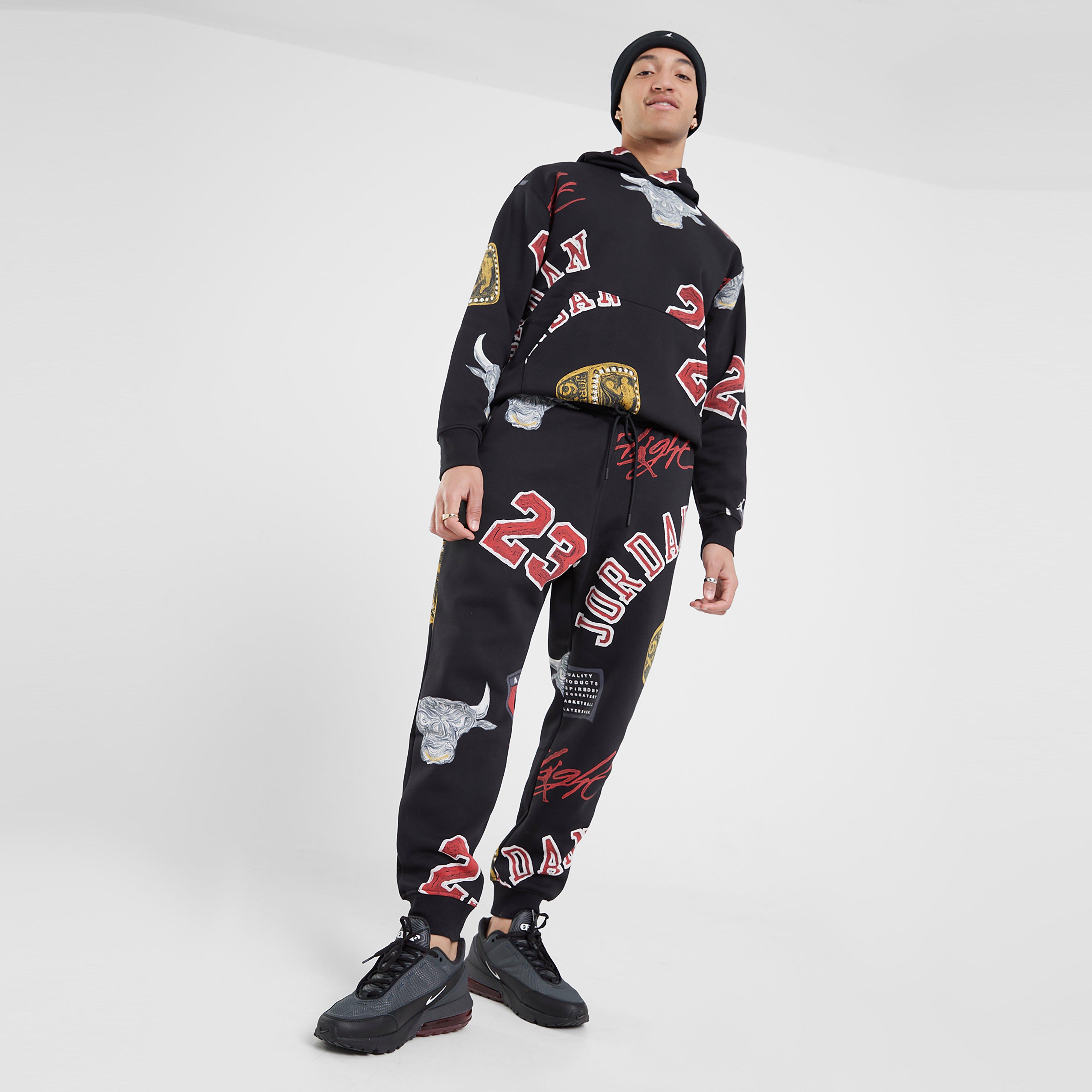 Férfi melegítőnadrág és jogger JORDAN NADRÁG M J ESS AOP FLC PANT