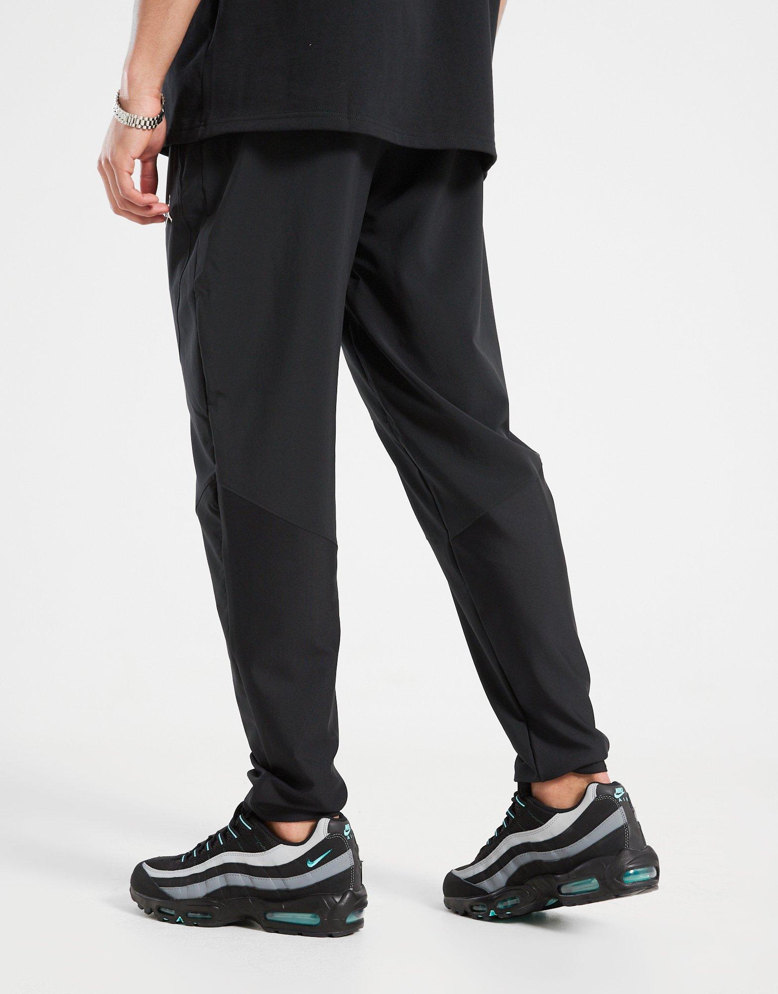 Pánské kalhoty JORDAN KALHOTY  M J DF SPRT WOVEN PANT FN5840-010 Černá